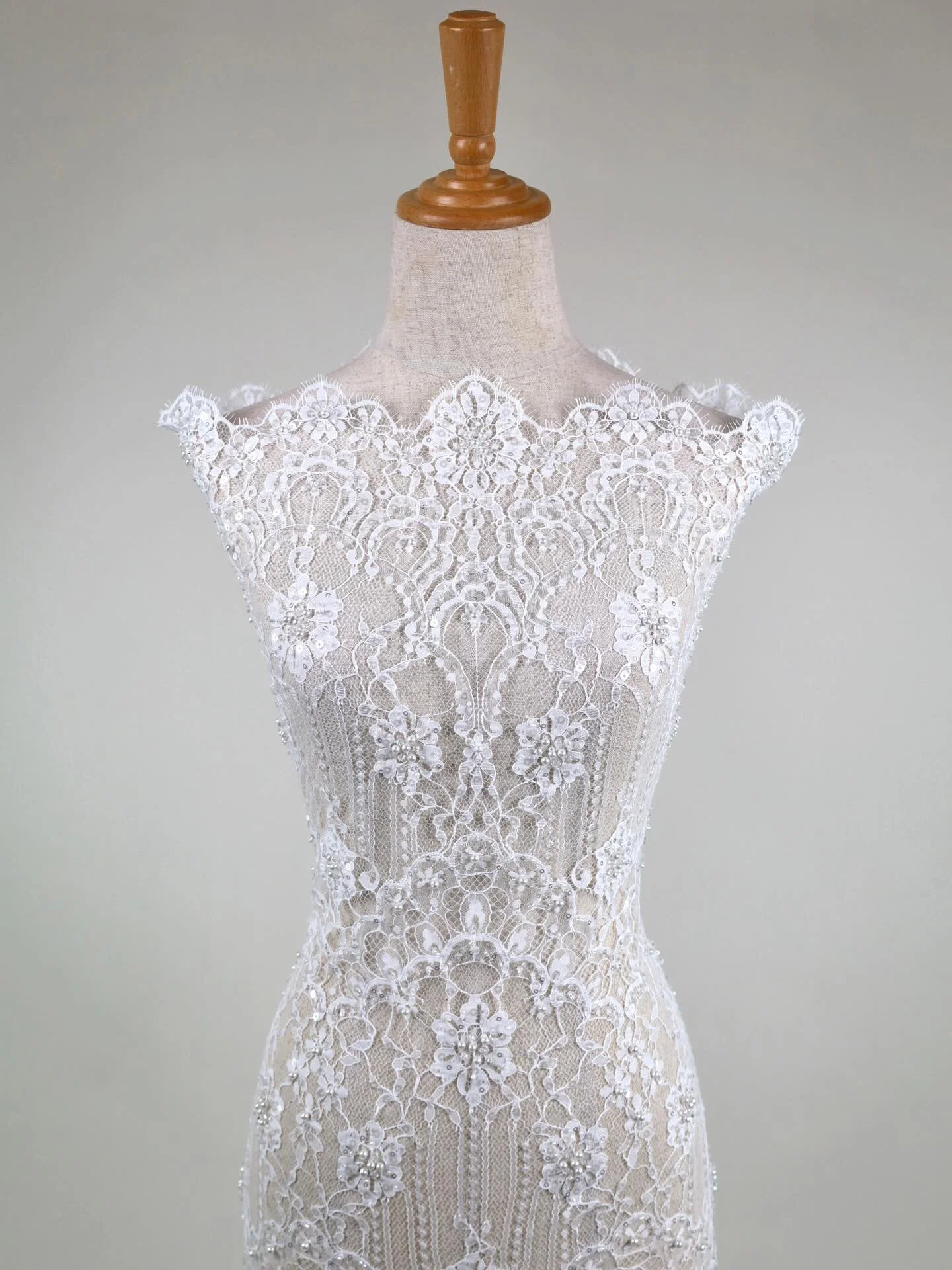 NEW ARRIVAL
F7070 Beaded Lace &middot; Natural &middot; 145cm wide

A beautifully balanced beaded lace in a soft Natural tone, designed for modern bridal with timeless romance. The pattern has an elegant symmetry with delicate scrollwork and floral m