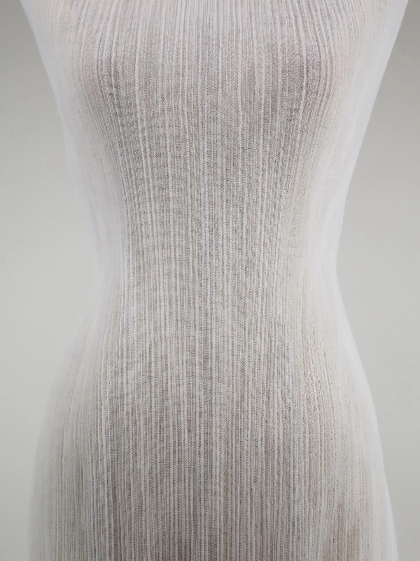 NEW PRODUCT &mdash; F8954.04 &middot; Pleated Tulle &middot; Ivory

A modern pleated tulle with fine linear texture and soft, fluid movement. The pleating adds subtle dimension across the body while remaining exceptionally light &mdash; a contemporar