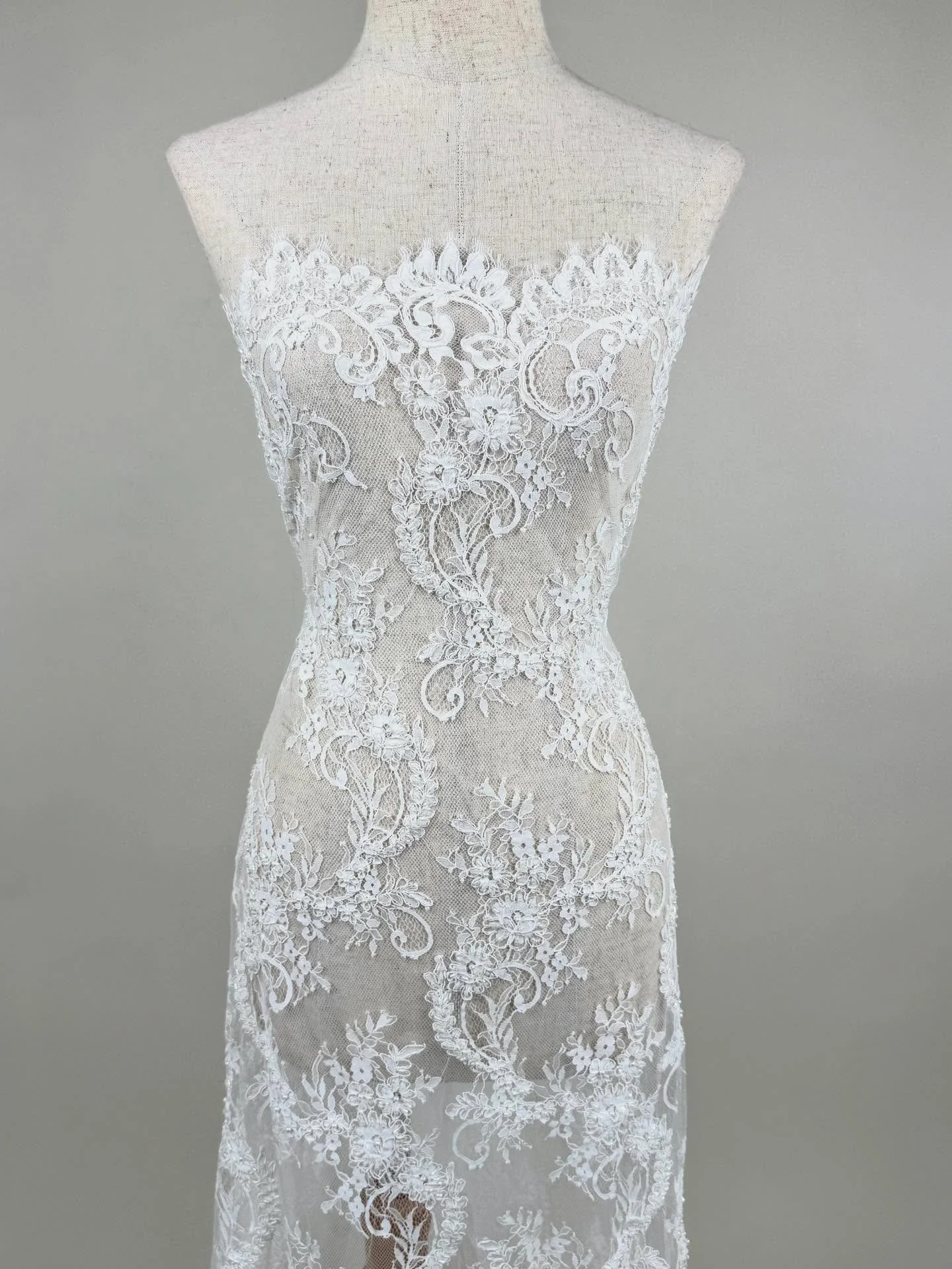 Just arrived: F9875CB &mdash; a corded and beaded eyelash lace in a beautiful Natural tone.

This is classic bridal elegance with real depth: softly raised corded motifs, delicate eyelash edges, and subtle beading that catches the light without feeli