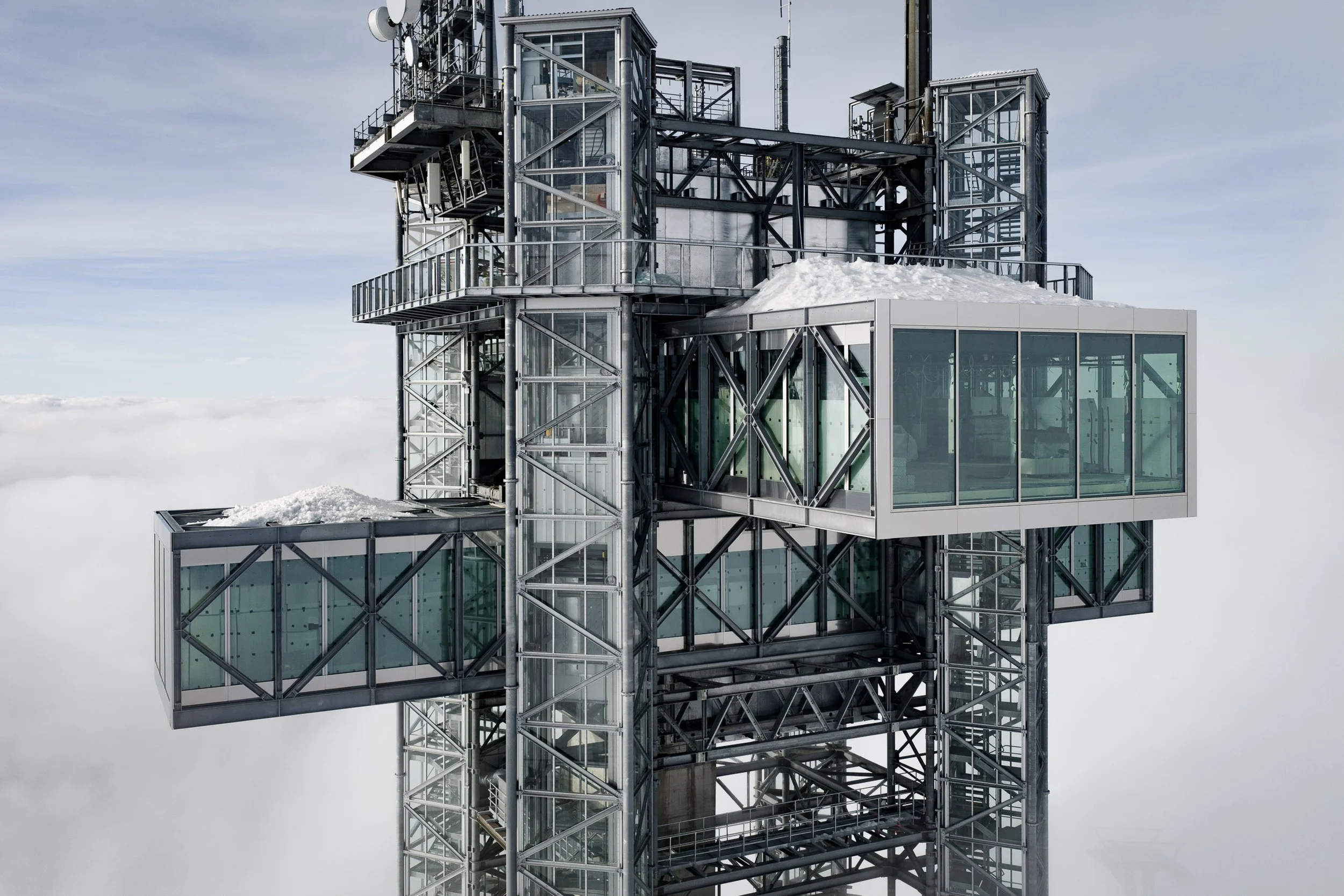 Titlis Tower by Herzog & De Meuron: a cross-shaped restaurant and observation deck shrouded in fog