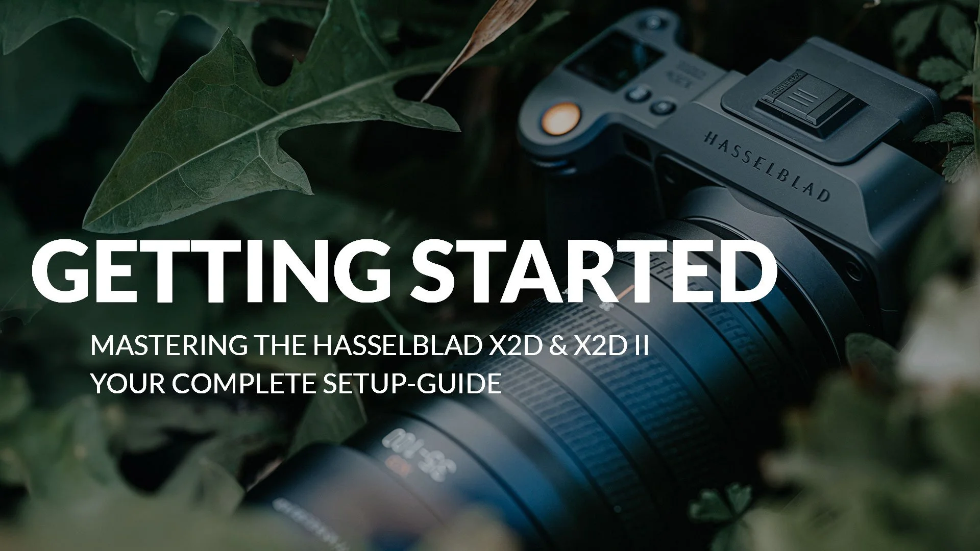A camera lens lies on sheets of paper, with a Hasselblad camera on the side, along with the text 'Getting Started: Mastering the Hasselblad X2D & X2D II, Your Complete Setup-Guide'