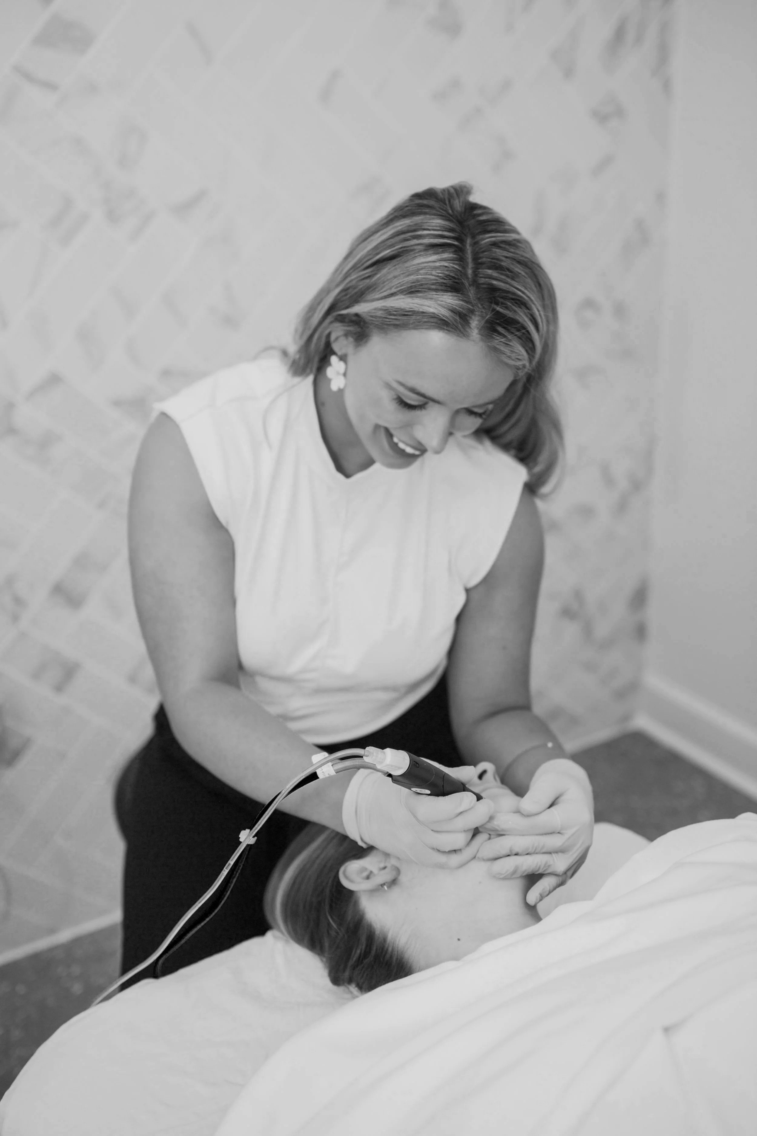 Provider performing a facial aesthetic treatment at LivWell Health medspa in LaGrange, Georgia