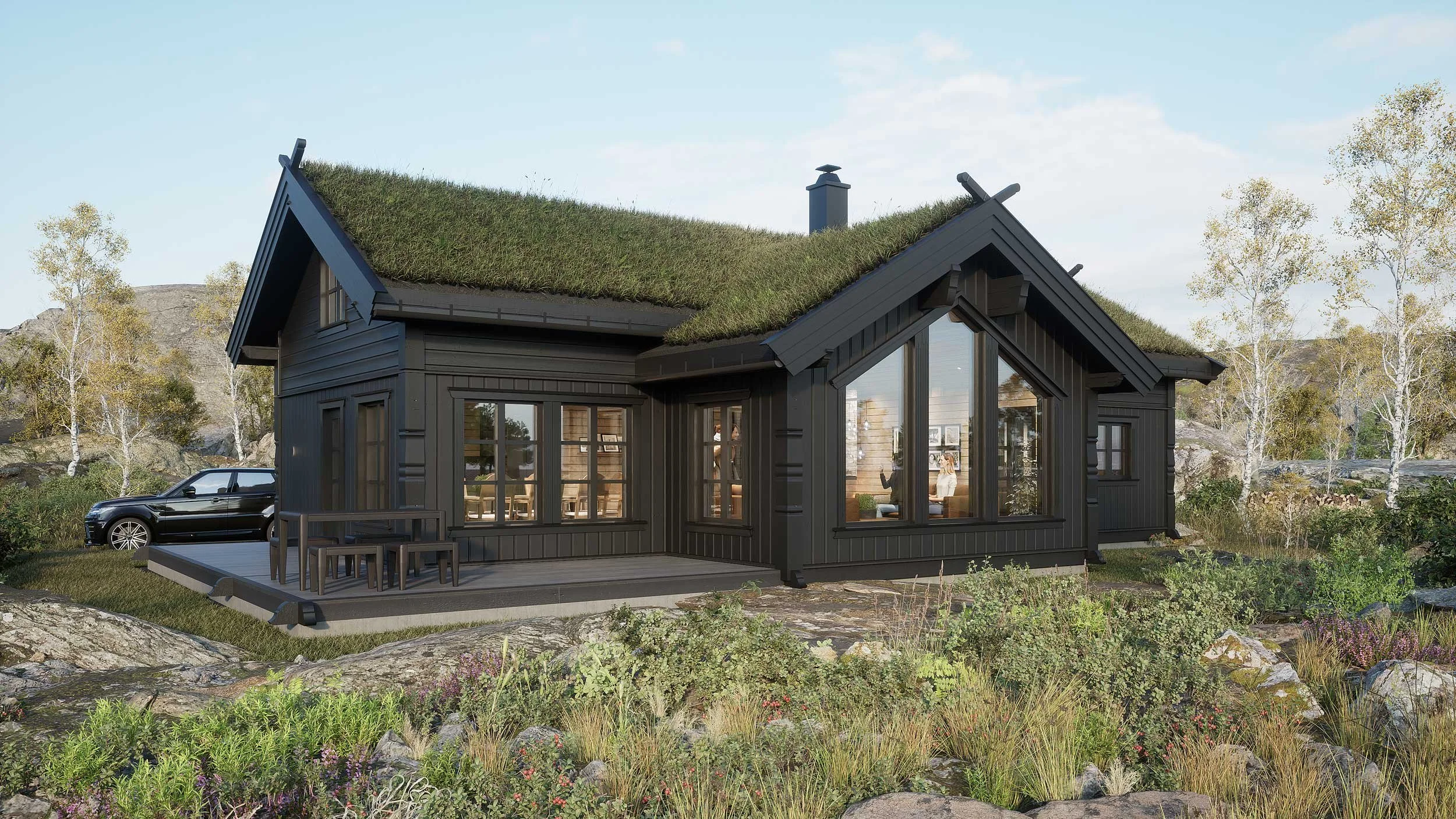 Moderne hytte med gress på taket, svart eksteriør, stor vinduer og veranda. Bilen står parkert ved siden av hytta, omgitt av natur med trær og fjellandskap i bakgrunnen.