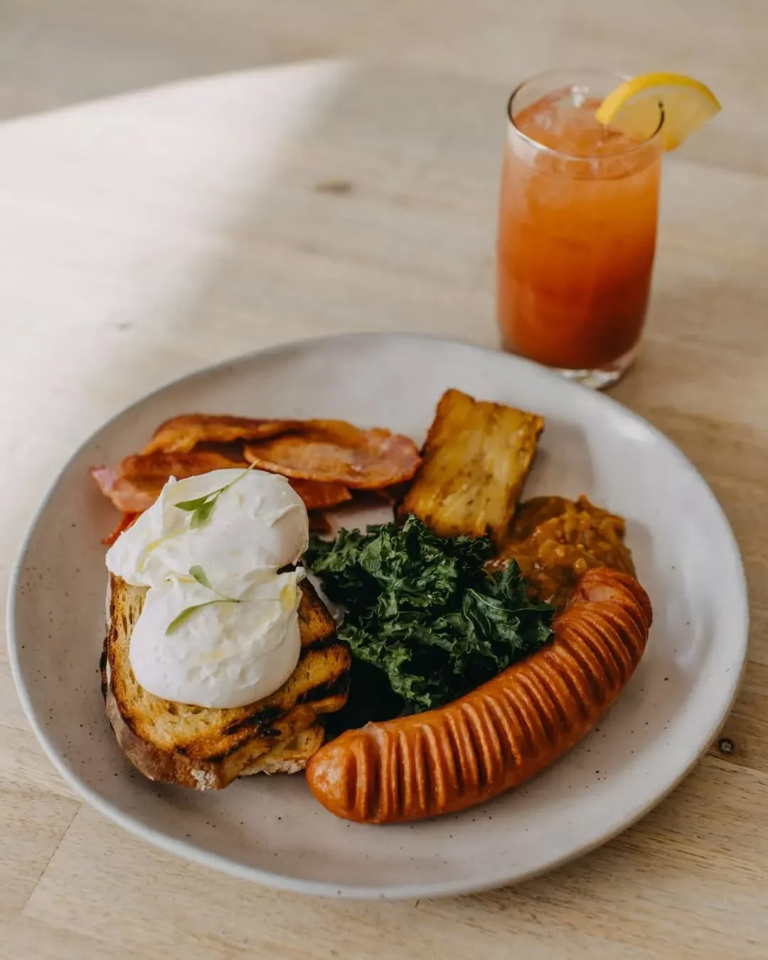 A true Farmhouse classic. Bacon, sausage and free range eggs served with our house made tomato relish, potato gratin, kale and chargrilled Yallingup woodfired sourdough. Best enjoyed with great company and all the good vibes.🍴✨

Join us, link in bio