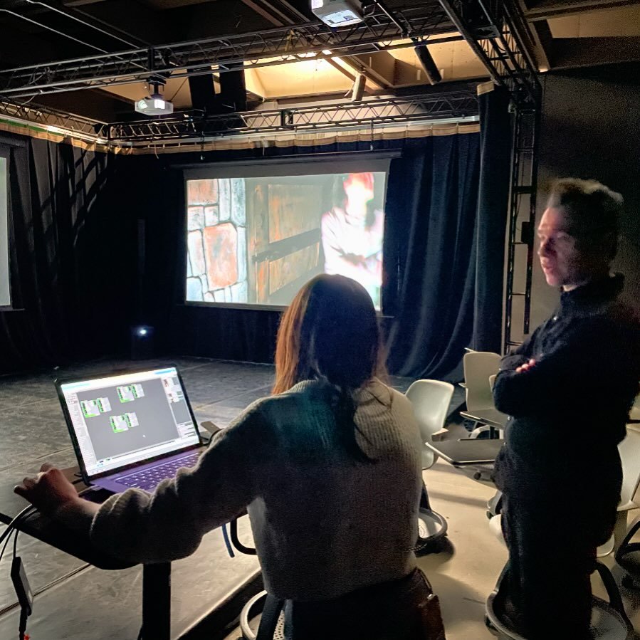 When creating media, tech problems are just part of the process. Here&rsquo;s Professor Kenneth Collins helping student Hollie Workman in the Intro Media Arts Production class last semester. Hollie&rsquo;s project, an installation piece called &ldquo