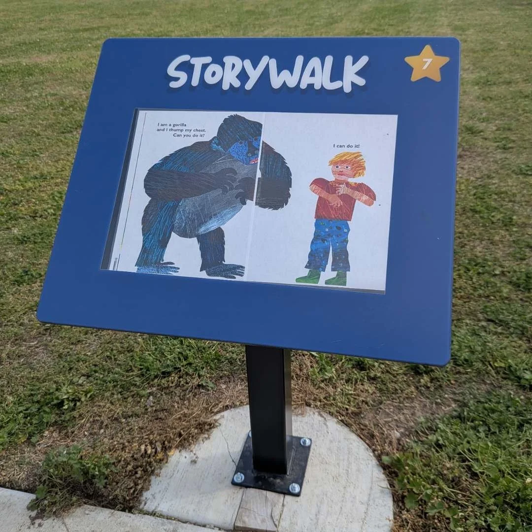 The First StoryWalk© Signs with Rounded Corners