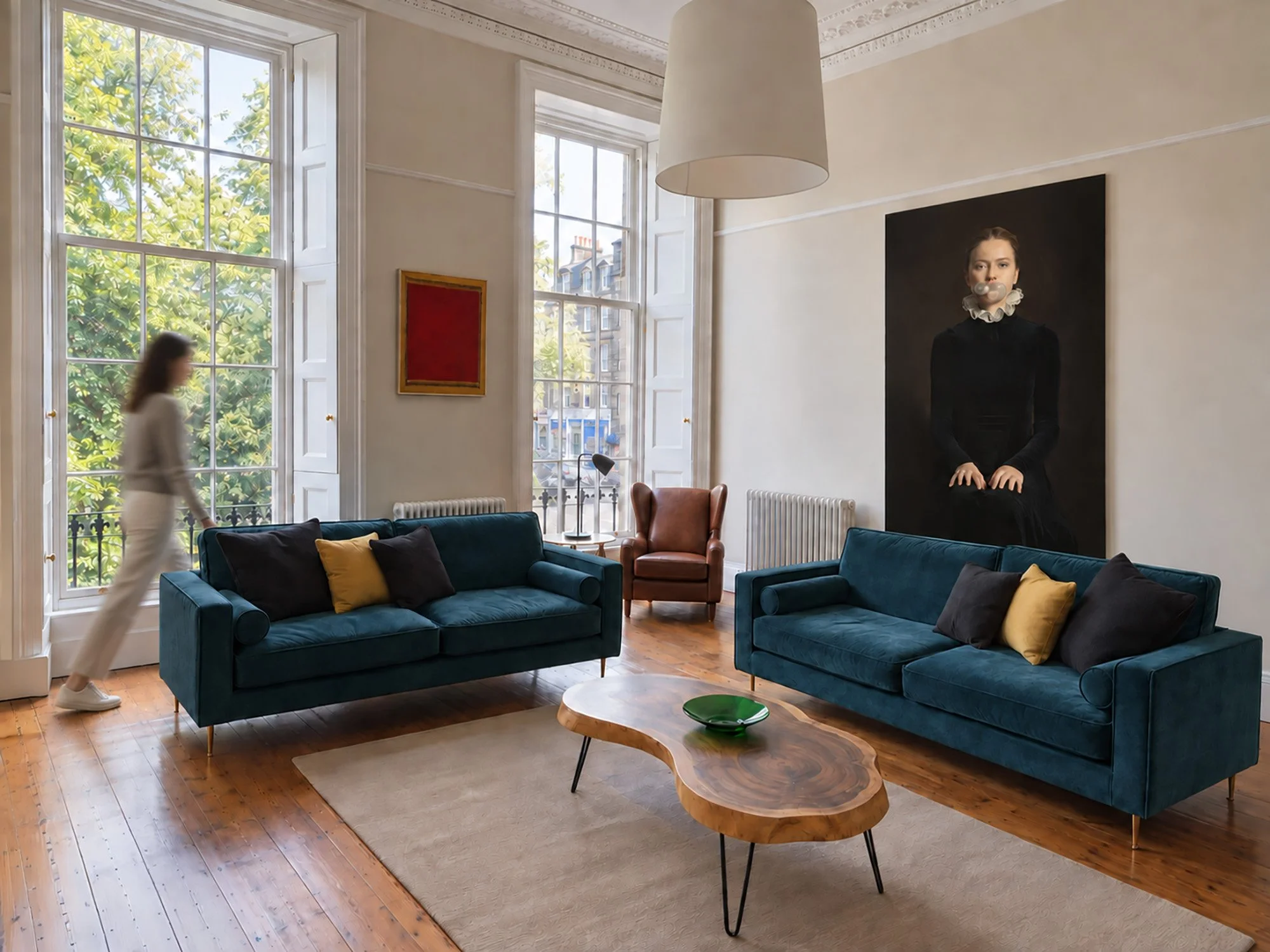 Edinburgh New Town living room with teal sofas, tall sash windows and a live-edge coffee table.