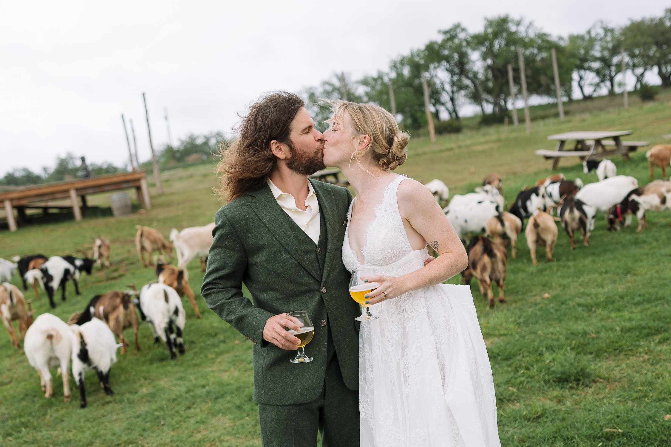 Rain, Goats, and Zero Posed Photos: Megan + Spencer's Jester King Brewery Wedding