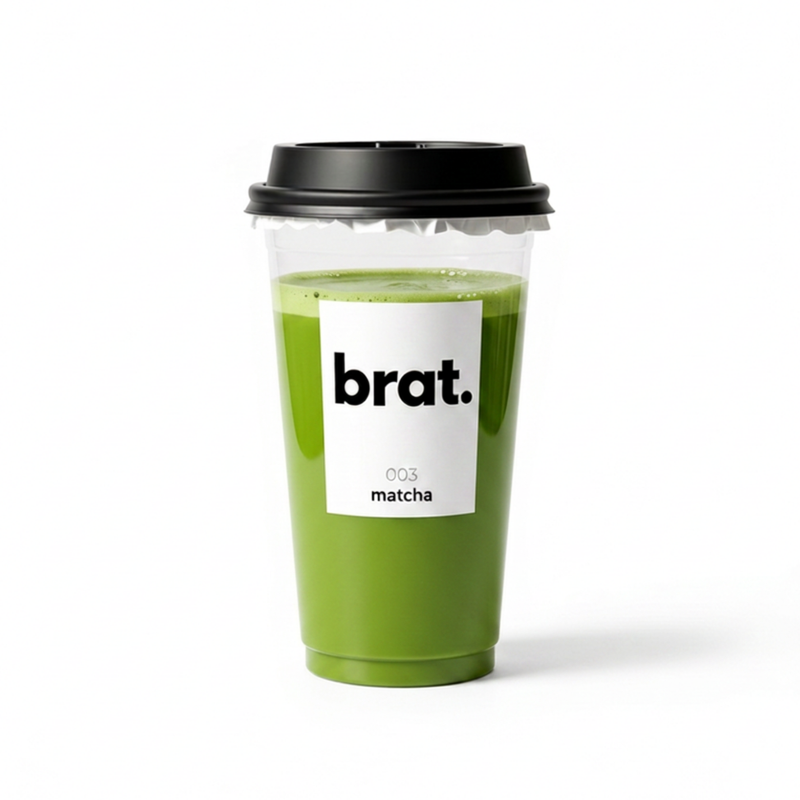 A clear plastic cup filled with green matcha tea, branded with a label that says "brat" and the number "003." The cup has a black plastic lid.