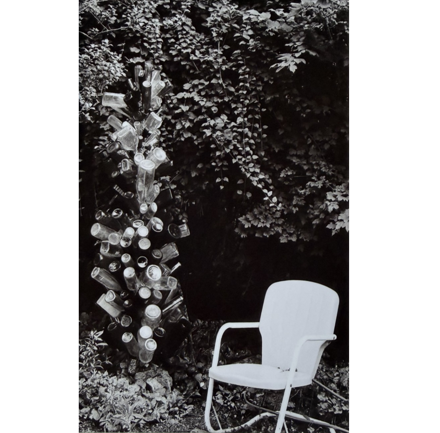 "Bottle Tree, Eureka Springs, Arkansas" Black and white photo approximately 4" x 6" , matted, NFS.