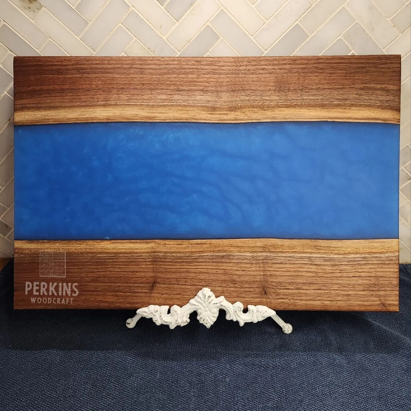 Live-edge Walnut and Sapphire Resin Charcuterie Board.  One of a kind. Just listed on PerkinsWoodcraft.com

#sapphire #sapphireresin #resinepoxy #resin #resinart #cuttingboard #charcuterie #charcuterieboard #smallbusiness #oneofakind #unique #liveedg