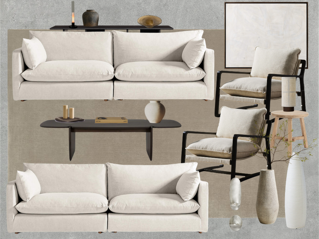 Living room with two white sofas, two armchairs with black frames, a black coffee table with candles and a book, a side table with a lamp, and decorative vases and art on the wall.