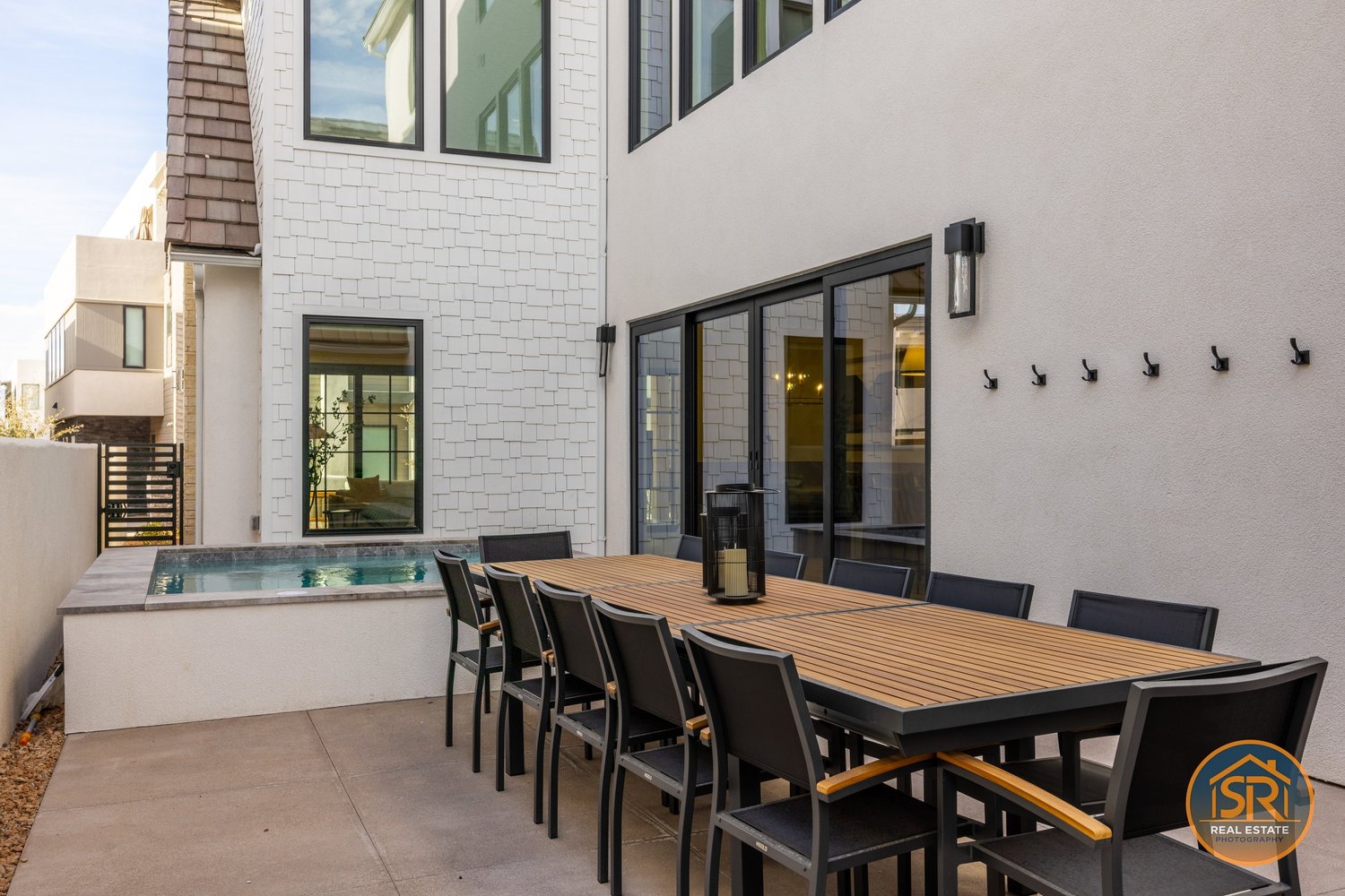Outdoor dining table on a shaded patio — from Sam Reed’s photography portfolio