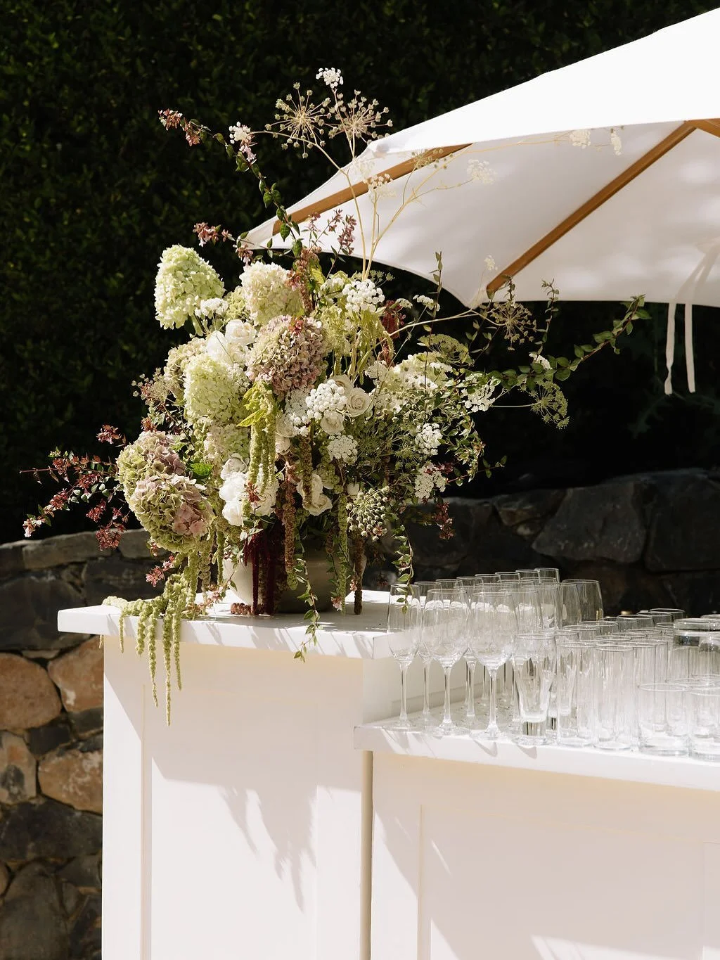 Cocktail moments in the summer garden, for S&amp;D

Photos 1,3-5 captured beautifully by @byclairehadler 

Planner: @quintanaevents 
Photographer: @byclairehadler 
Florals: @linzygriswold 
Hair: @breannacohoonhair 
MUA: @bellaglowbeautystudio 
Venue: