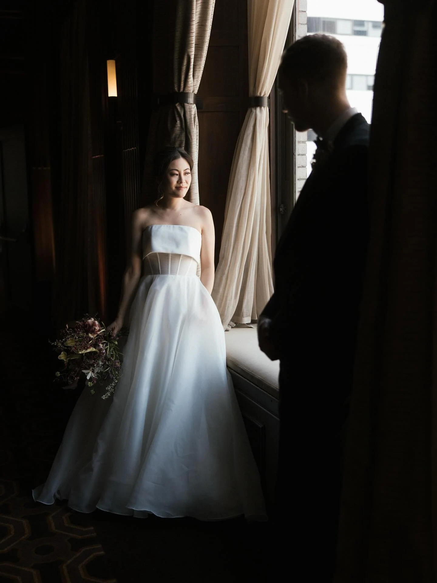 Meet me in the city ✨

T&amp;N in the springtime, our forever favorite season. With all the moody March flowers, orchids, and fritillaries, a minimal branch-y chuppah install, San Francisco&rsquo;s golden light, that cake, and peep @skae.flwrrrr in a