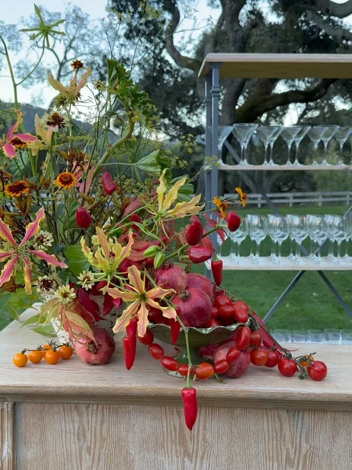 A little BTS of the tomato jam piles, spicy little peppers, and pizza ingredient inspired florals for A&amp;K&rsquo;s Welcome Party, which kicked off our last wedding of the season. 🍅🌶️🍕&hearts;️

@rowynevents 
@dani.clrk 
@pourgirl 
@chiceventren