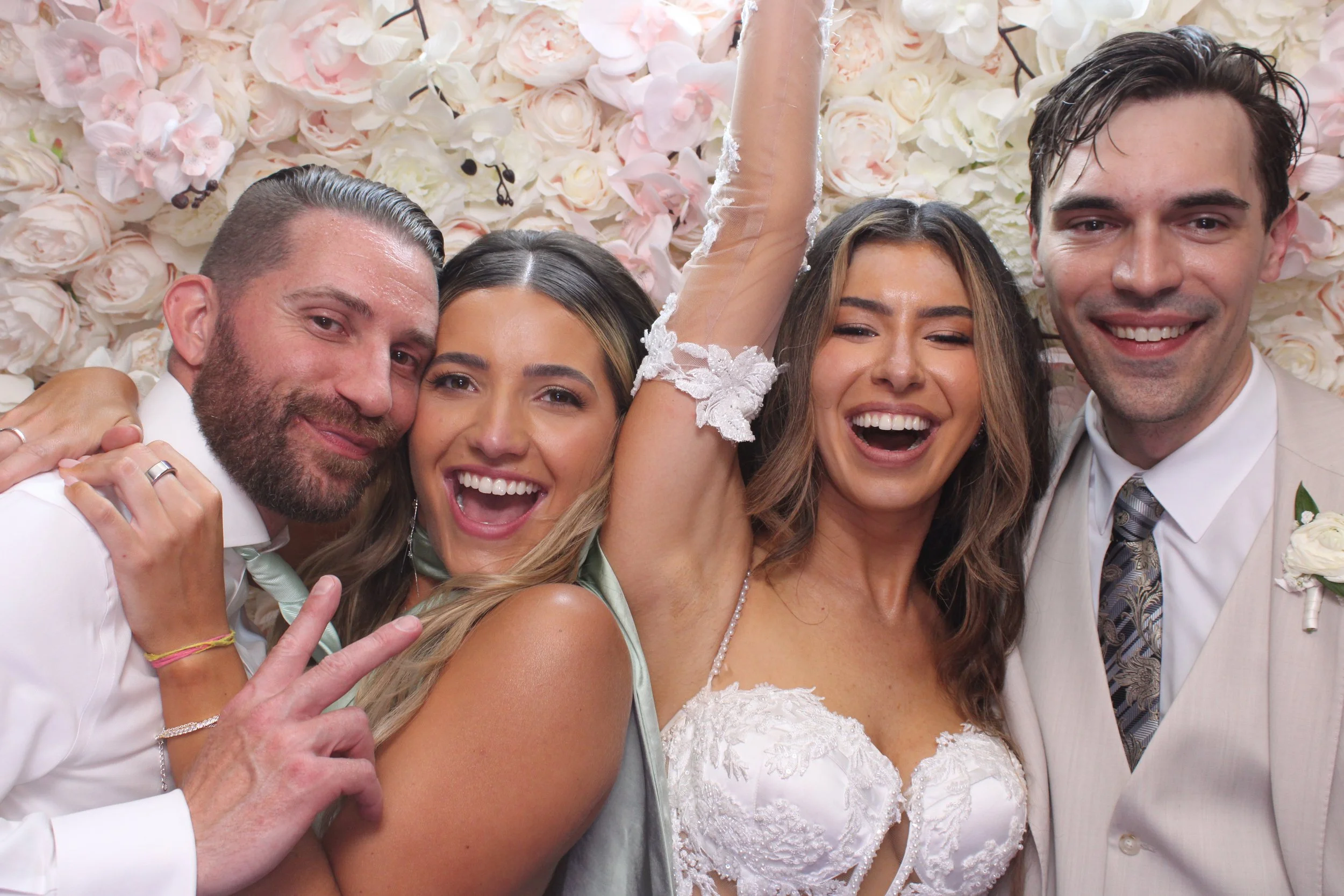 photo booth wedding with flower wall best photo booth in nj ny draping, neon sign in NJ florist brownstone, the grand, seasons, rails steakhouse, legacy castle the grove, the grand , the venetian , the rockleigh, hudson house, liberty house