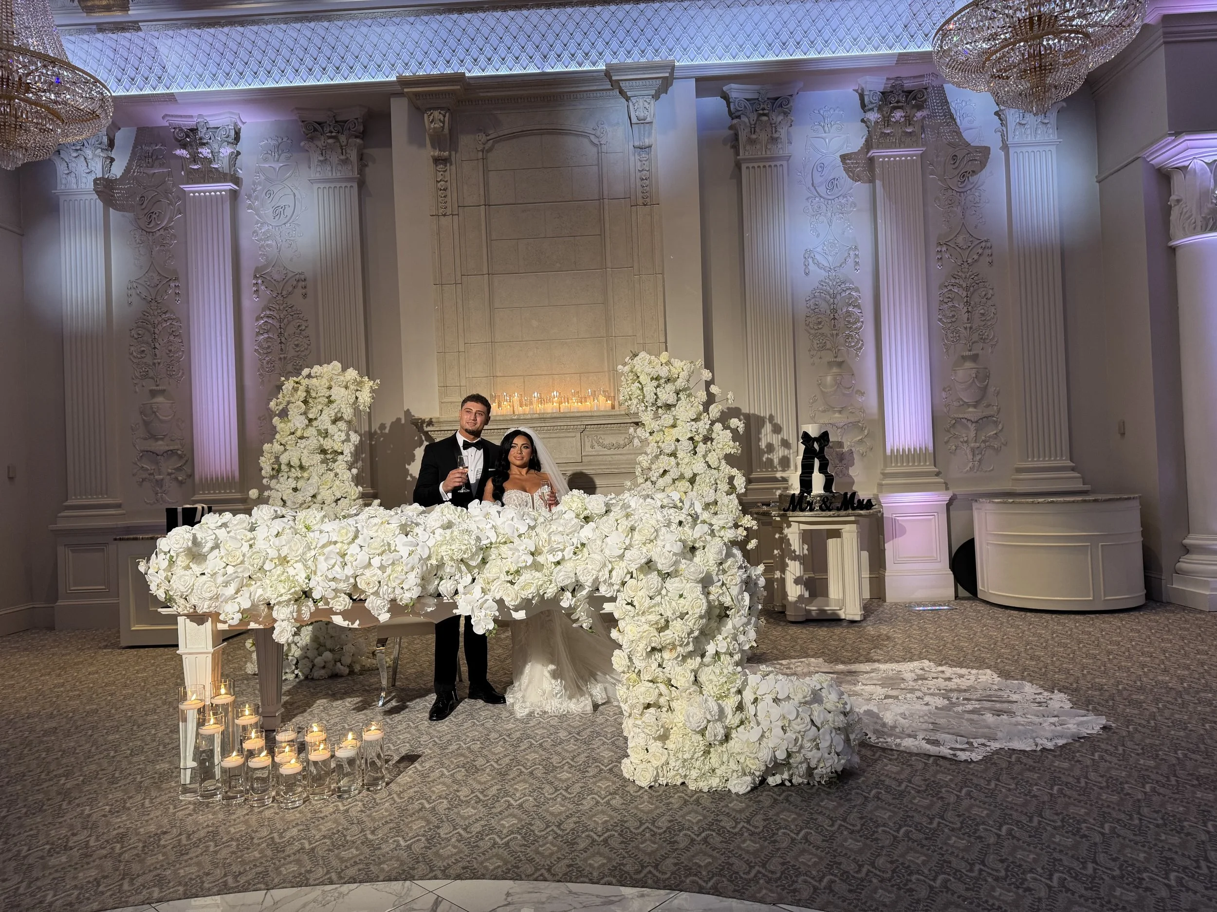 sweetheart table decor for wedding cascading white florals sweetheart table best goals in NJ New Jersey best florist affordable high end luxury