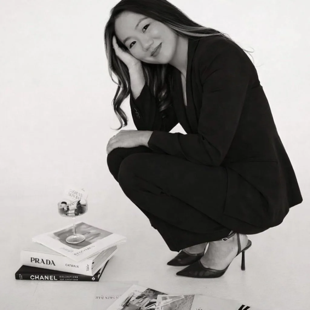 Black and white portrait of Lily, founder and floral designer of Blooms by Lily, a luxury wedding florist in New Jersey and NYC