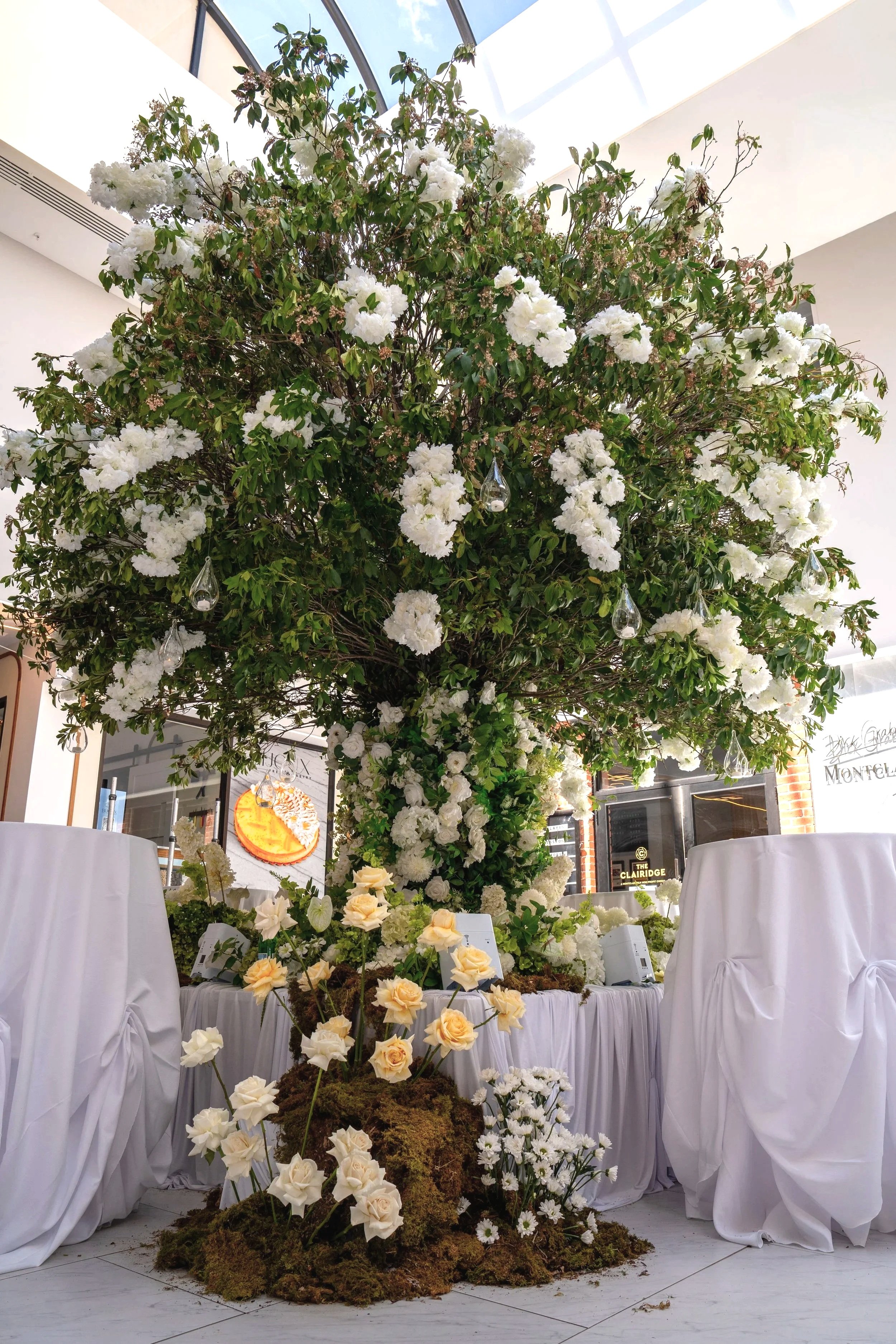 Montclair Mezzanine lobby tree 25ft cocktail hour at the lobby commissioned piece of tree art