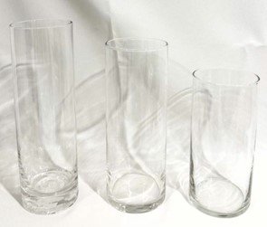 Glass vases. Large (qty 3) 10"H x 3"W   / Medium (qty 7) 9"H x 3-1/2"W  /  Small (qty 7) 7-1/2"H x 3-1/2"W