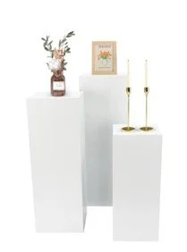 White pedestals. 
Sizes: 
Tall 4-ft H x 12"W 
Medium 3-ft H x 12"W
Small 2-ft H x 12"W