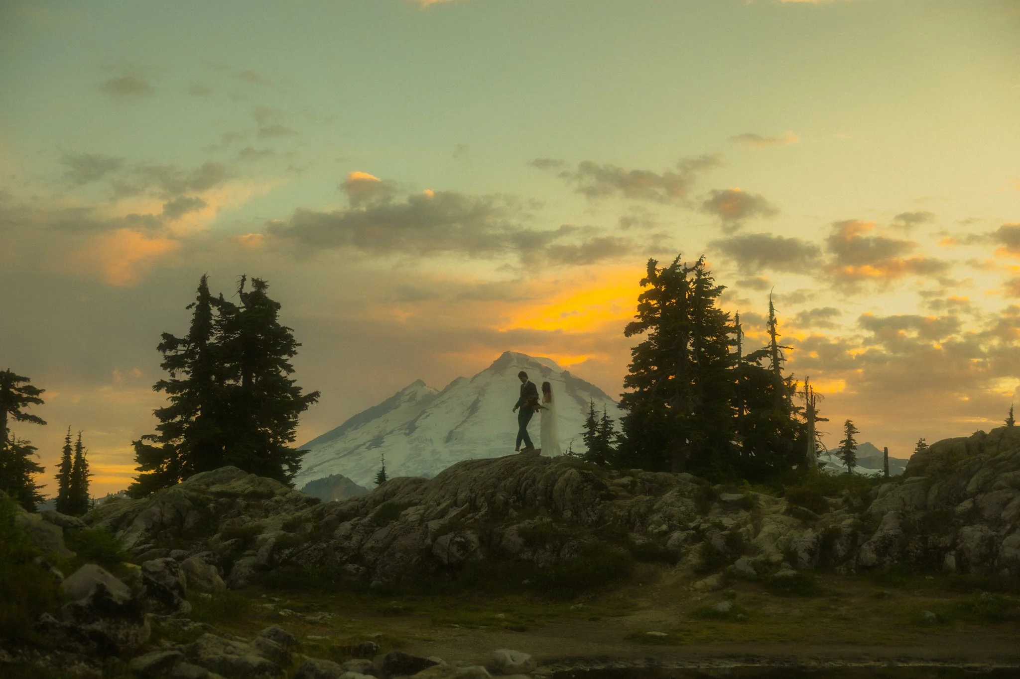 an elopement couple in Mt Baker at sunset