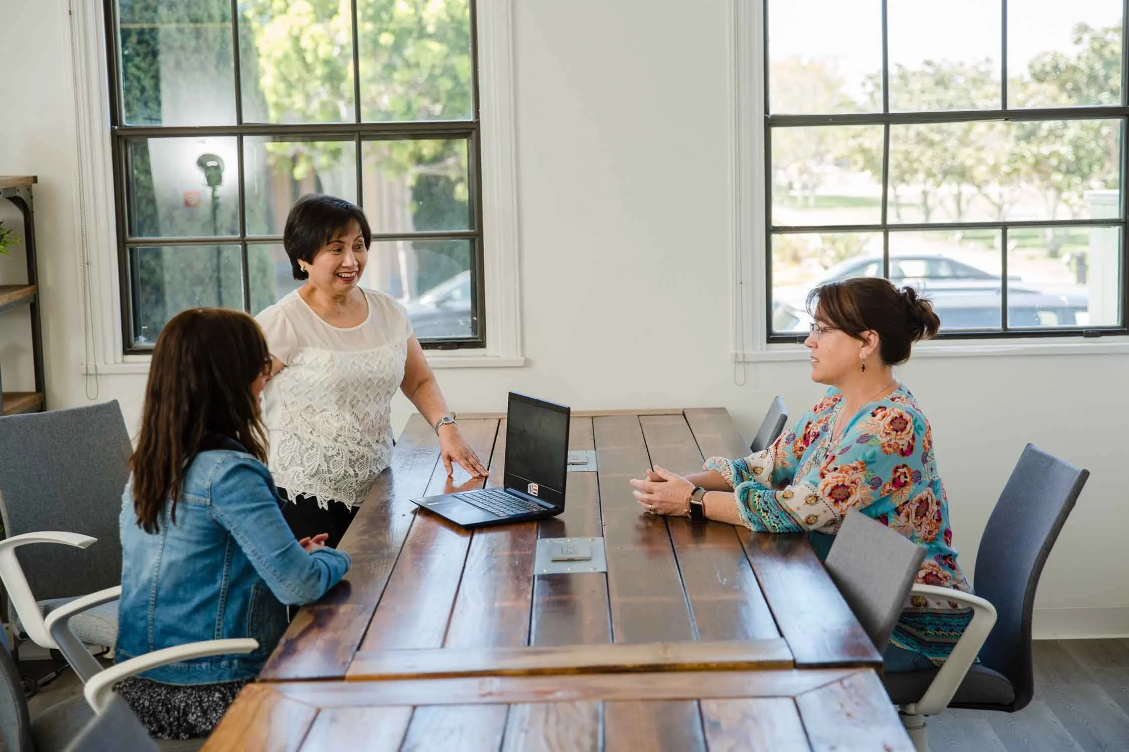 nonprofit team working in person in office together