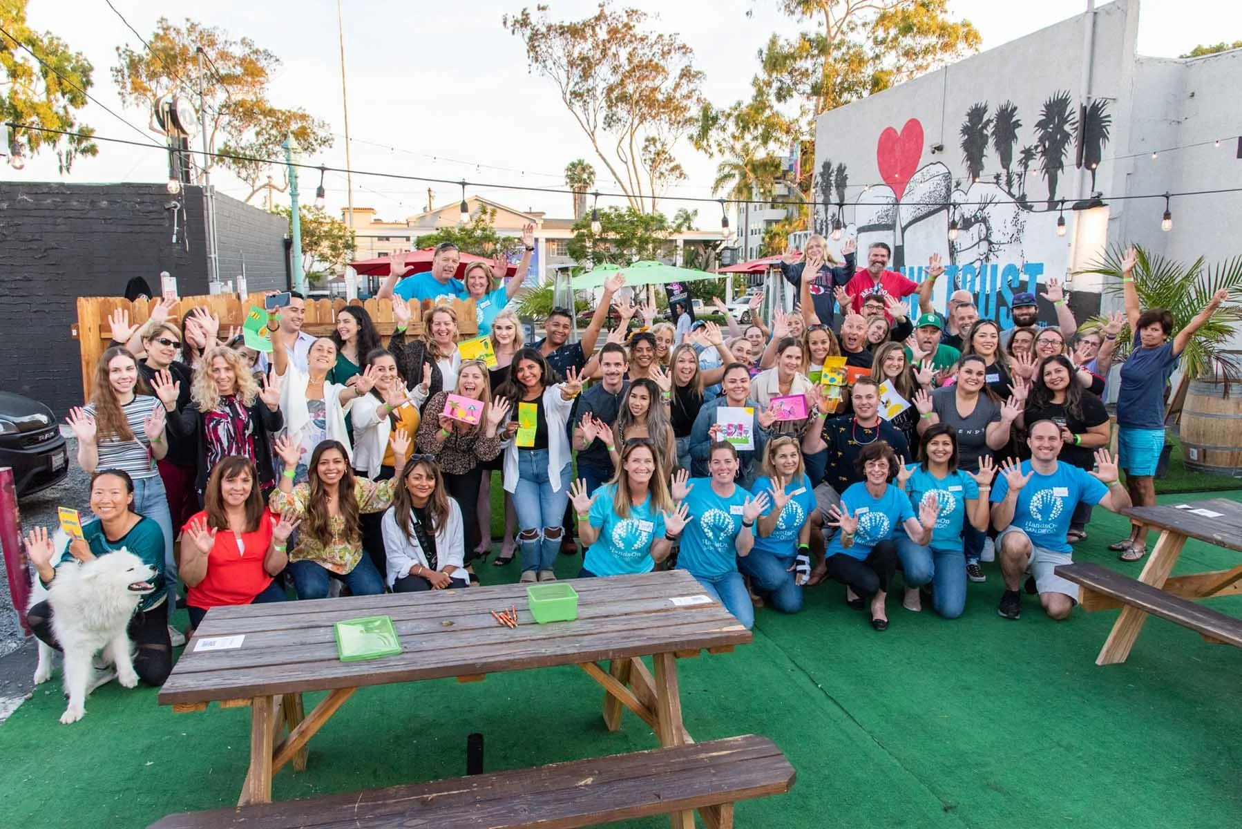 fiscal sponsored project at brewery doing activity and taking a group photo
