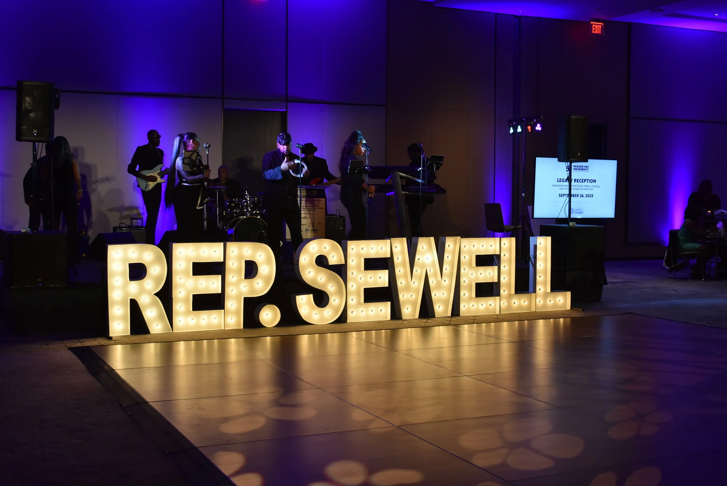 Band and lighted sign for Rep Sewell during the CBCF Annual Legislative Conference 2025