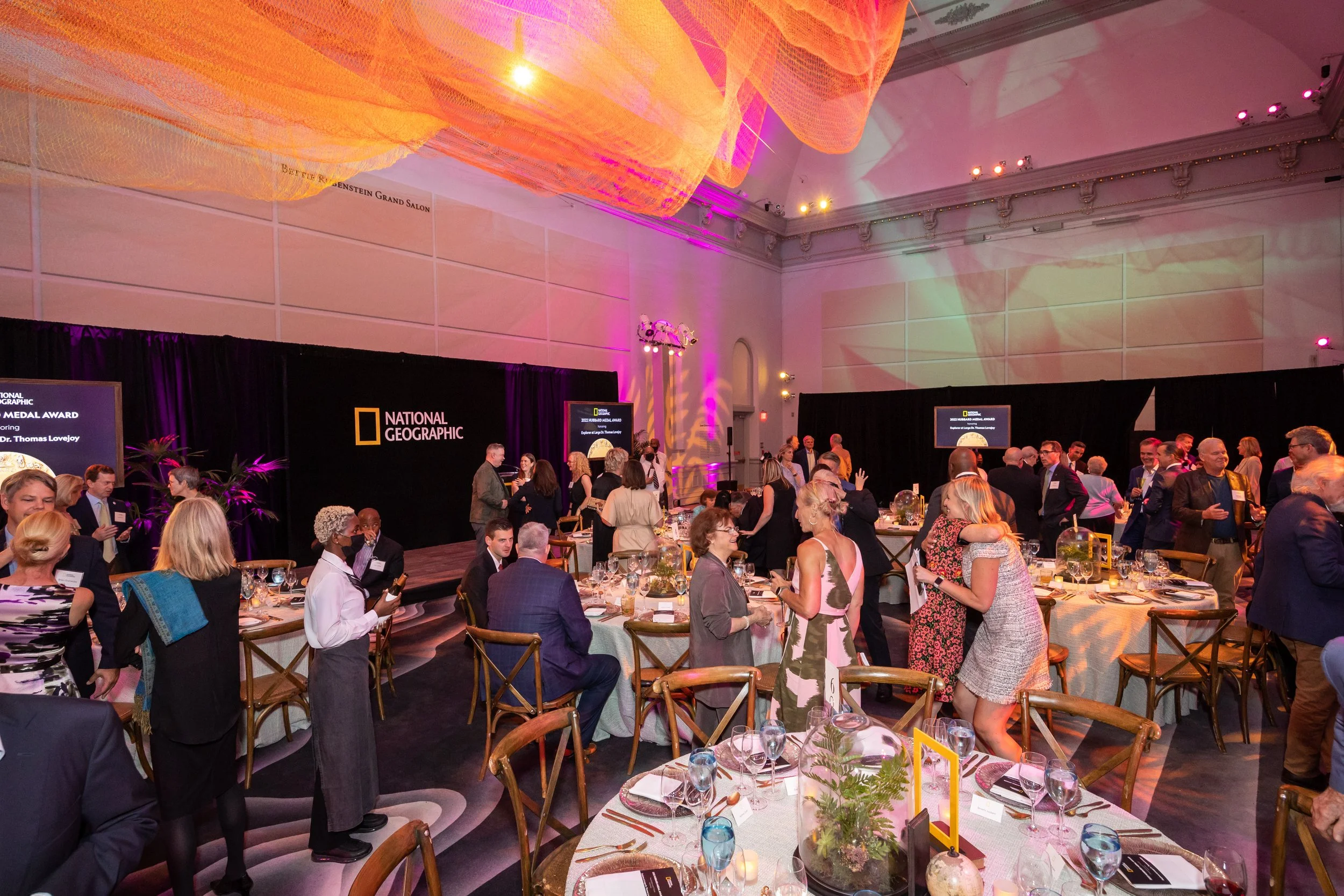 Guests mingling during a National Geographic private event