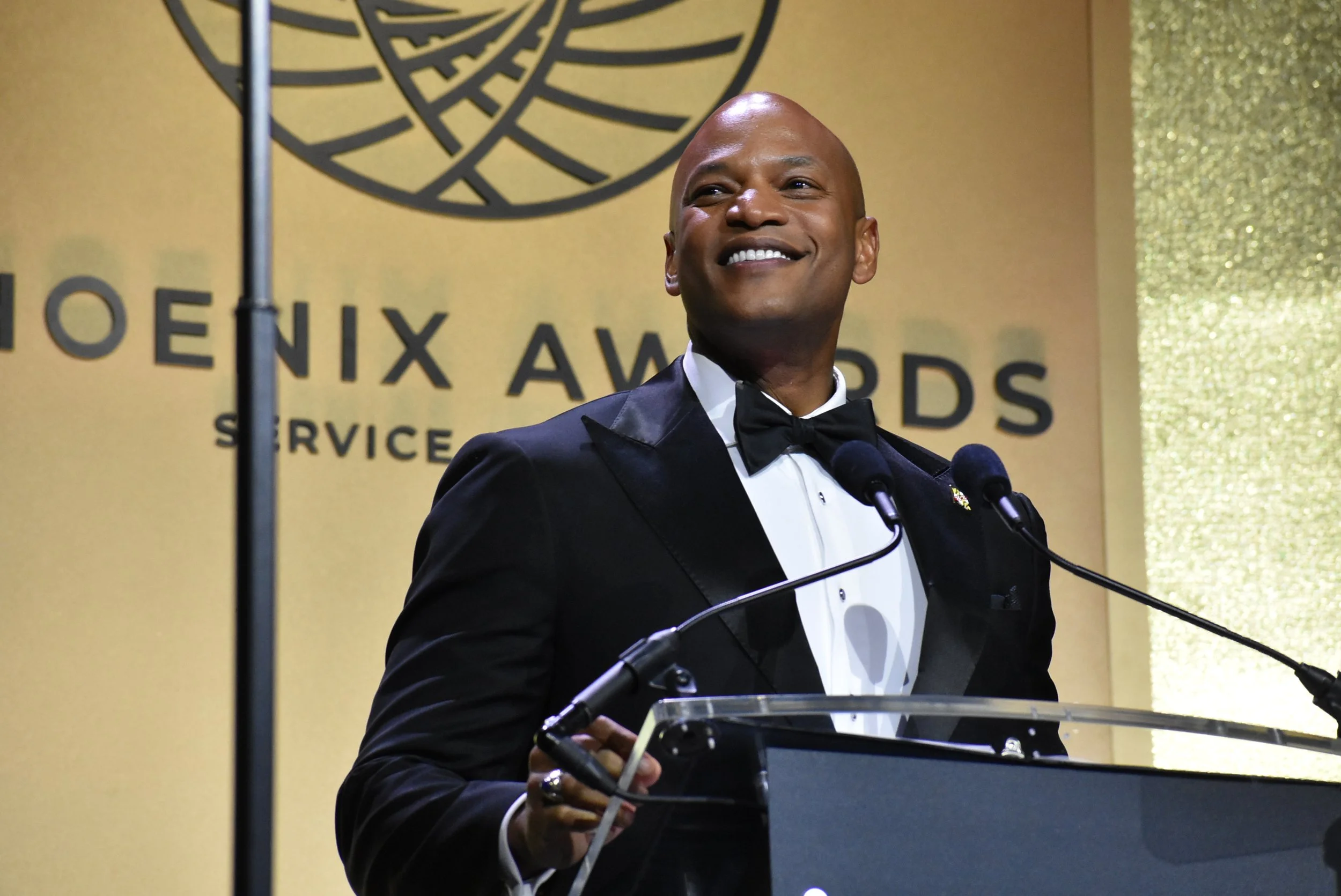 Maryland Governor Wes Moore on stage delivering an inspirational speech during the Phoenix Awards Gala and Dinner at the 2025 Congressional Black Caucus Foundation's Annual Legislative Conference. Event produced by DC event agency Stratus Firm