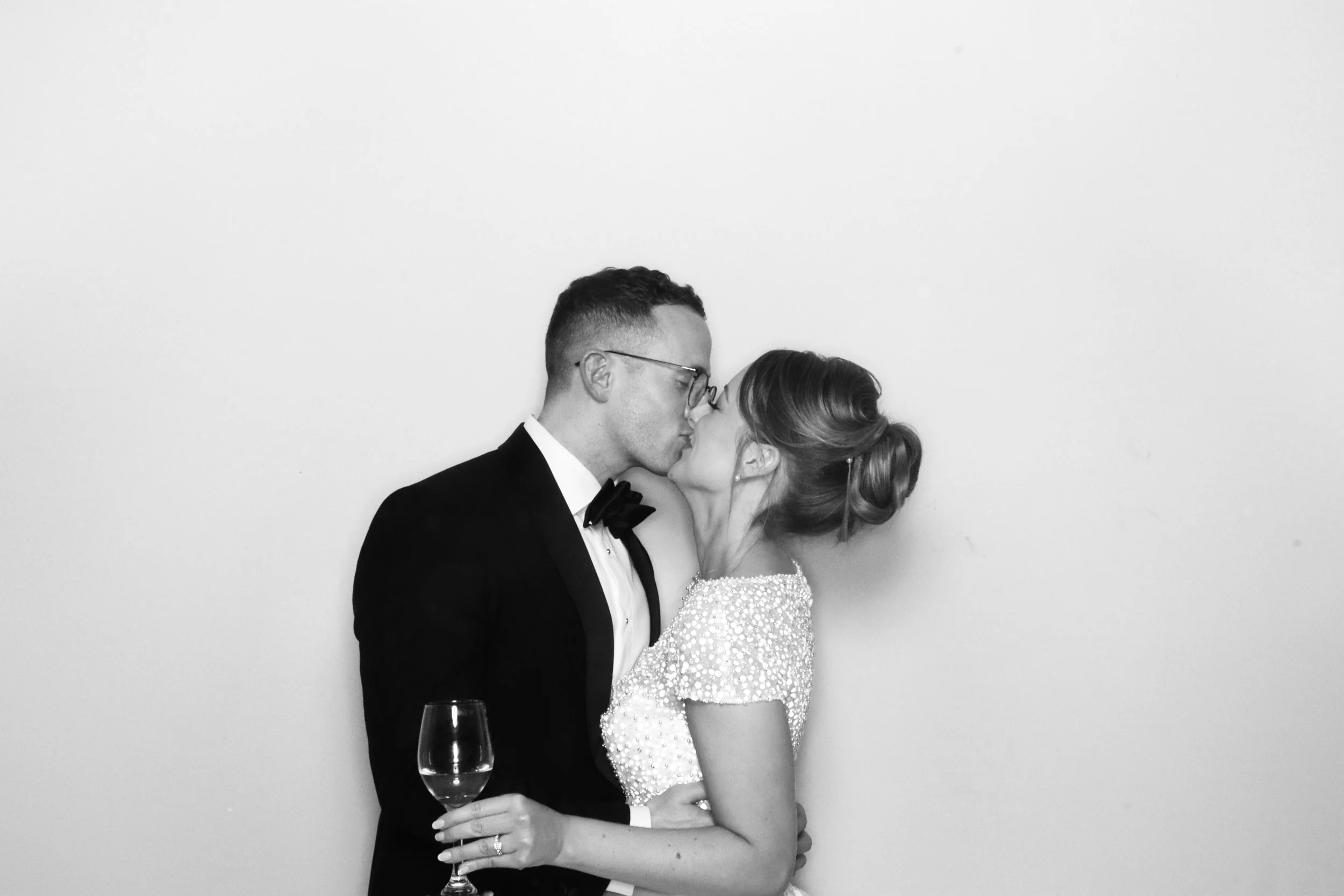 wedding of couple in black and white glamour photobooth