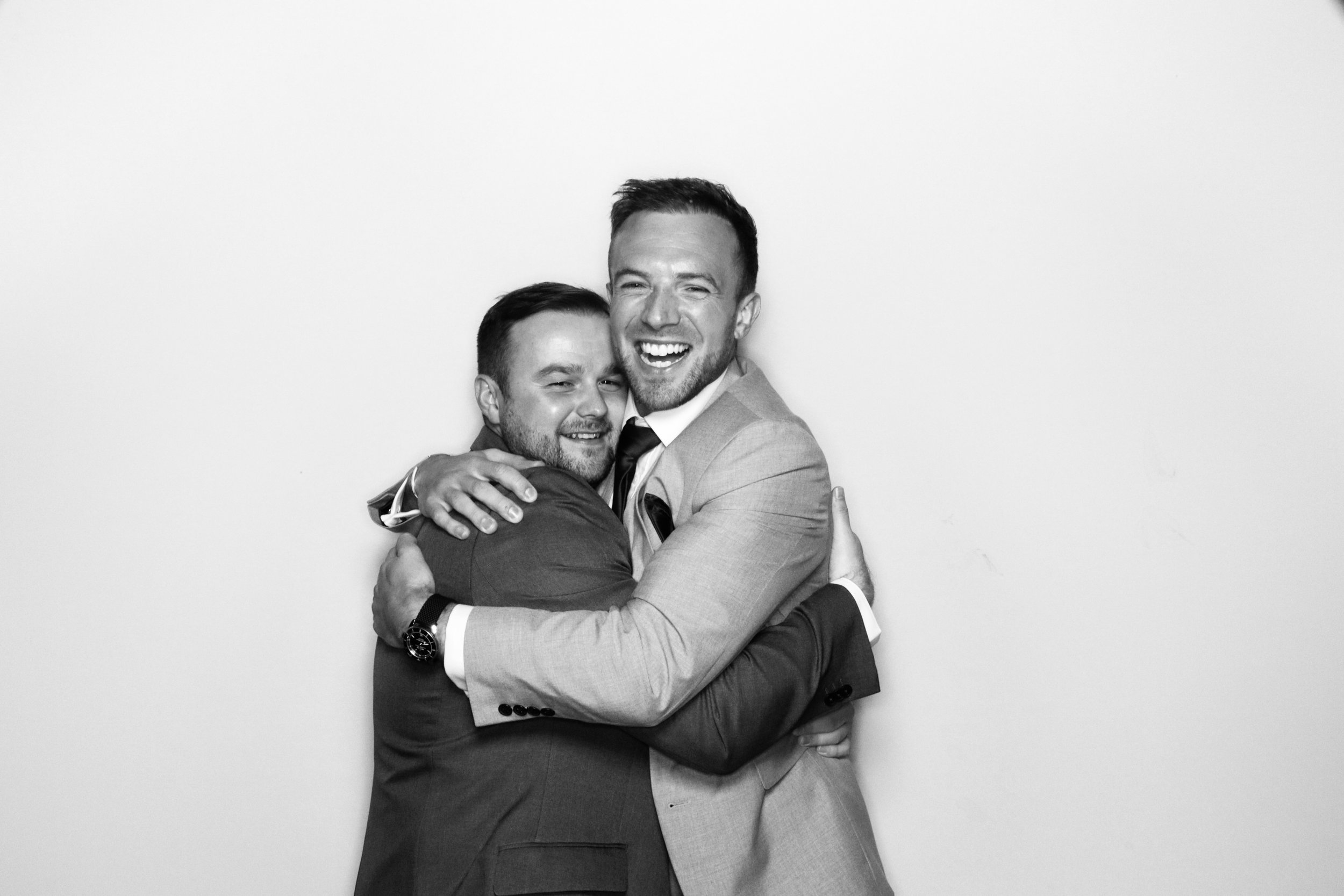 gay couple in glamour photobooth