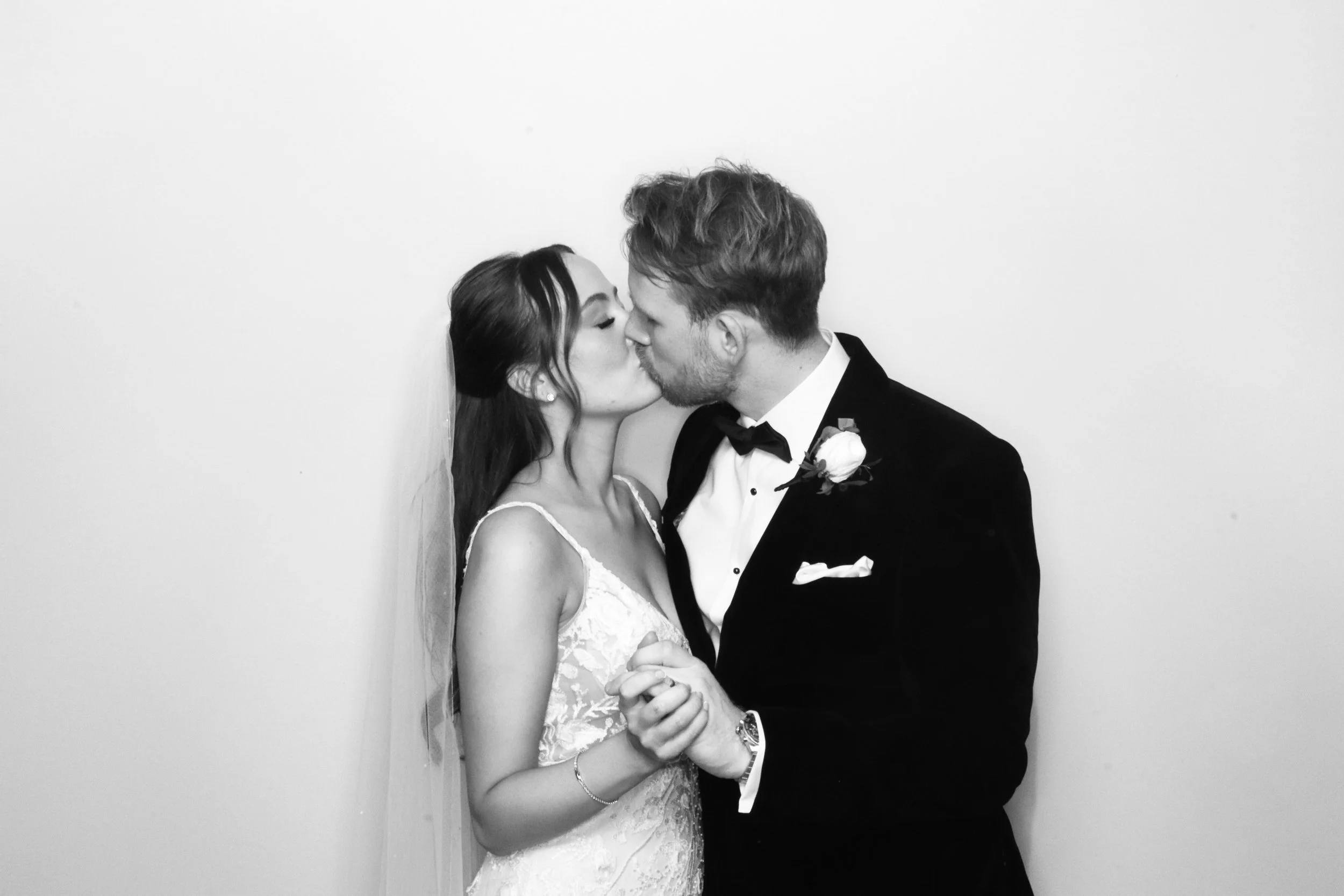 black and white couple in photobooth