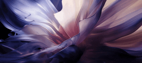 Abstract swirl of colors with shades of blue, purple, and beige.