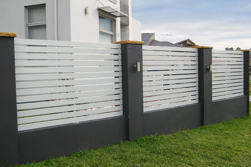Custom aluminium slat privacy fence installed between face brick pillars in Morayfield QLD 4506