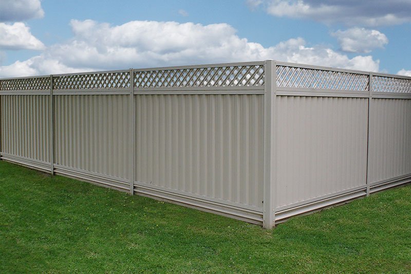 A Surfmist / Off White Gramline steel boundary fence installed as a durable alternative to a standard Colorbond fence.