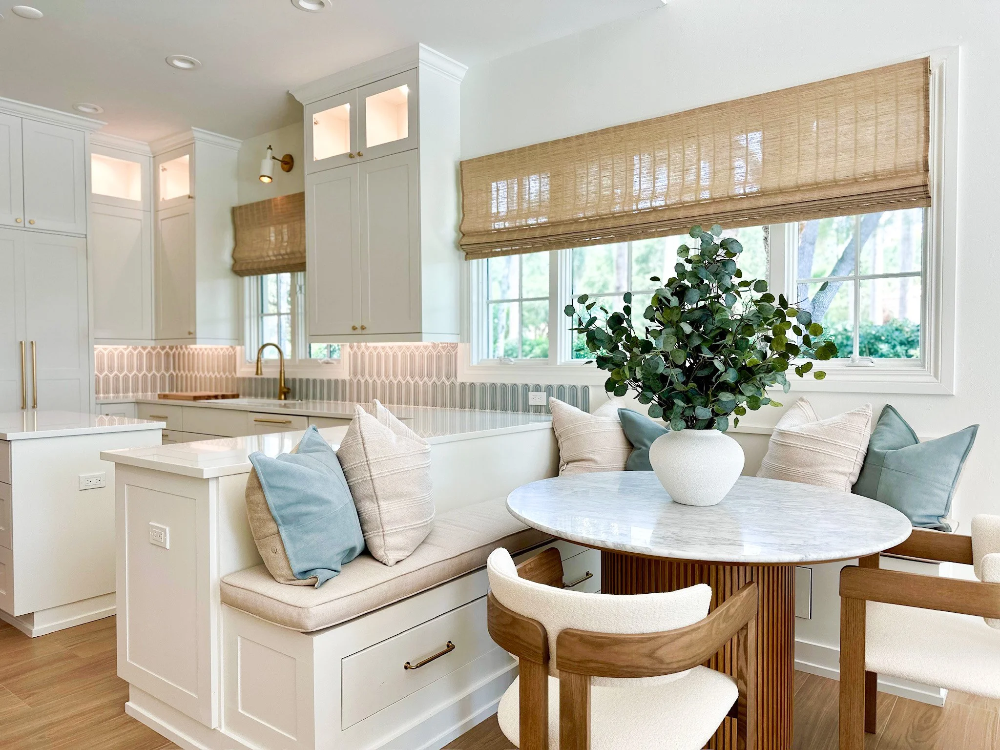 Interior design- coastal kitchen design. Dining table and kitchen in Naples Florida.