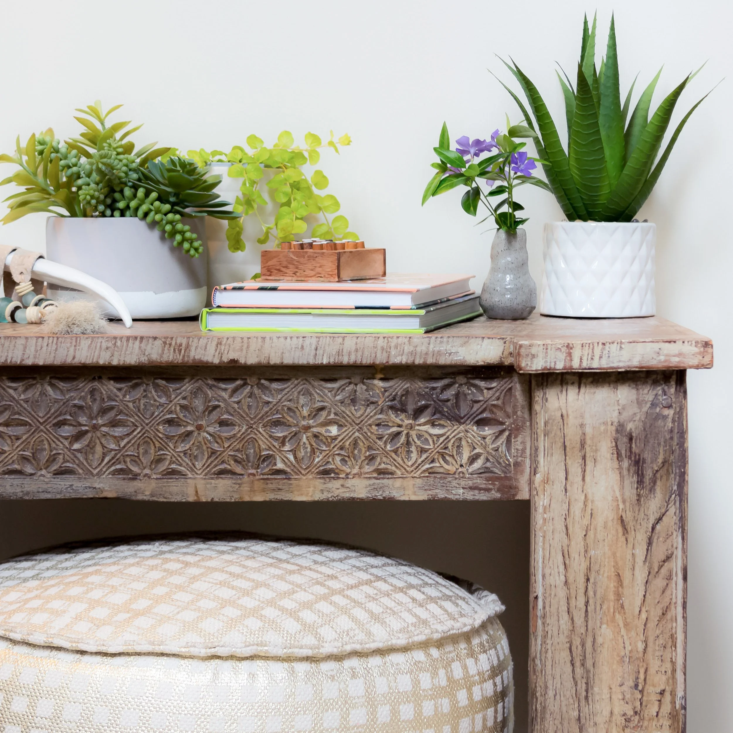 Duxbury Antique rustic console table with plants and books styled by Lark and Soul interior design