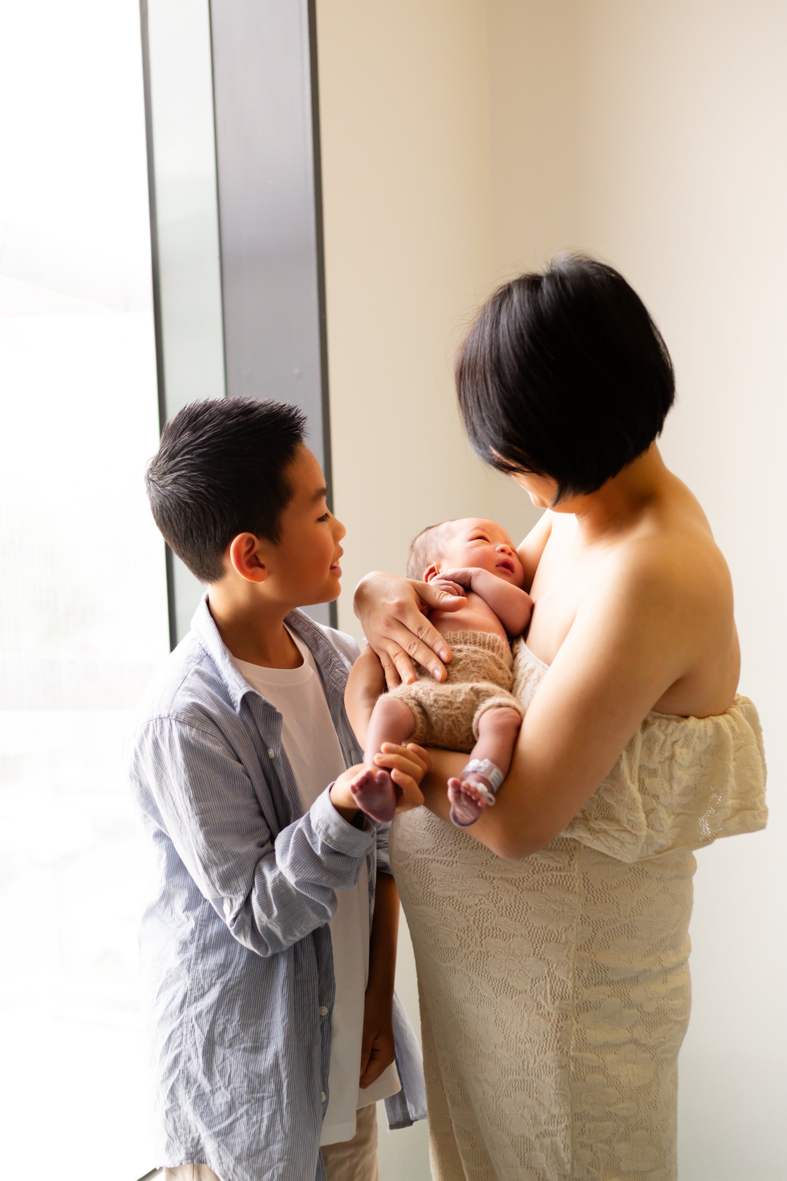 First family portrait taken in hospital after birth during a Fresh 48 newborn session in Geelong.