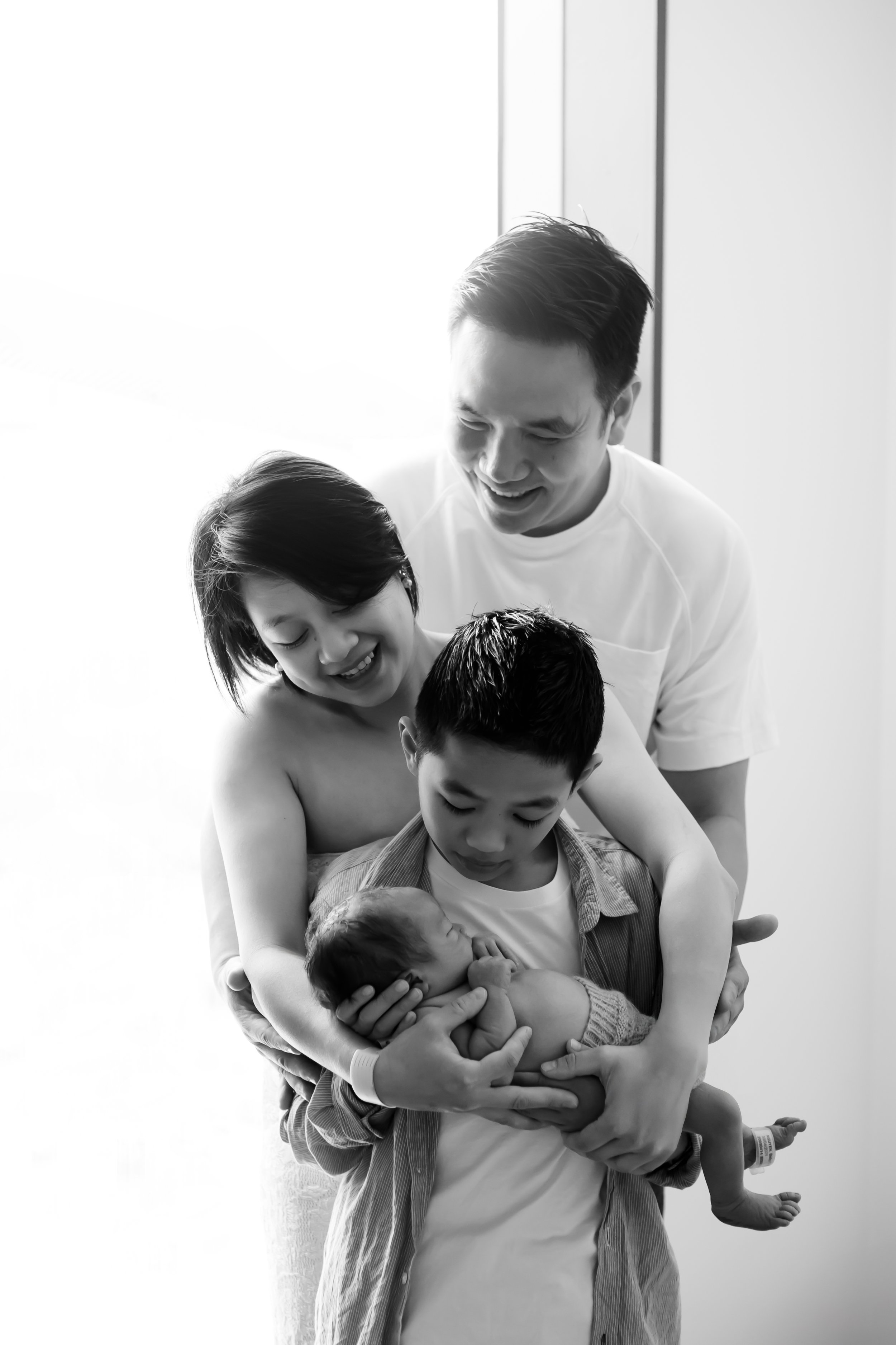 First family portrait taken in hospital after birth during a Fresh 48 newborn session in Geelong.
