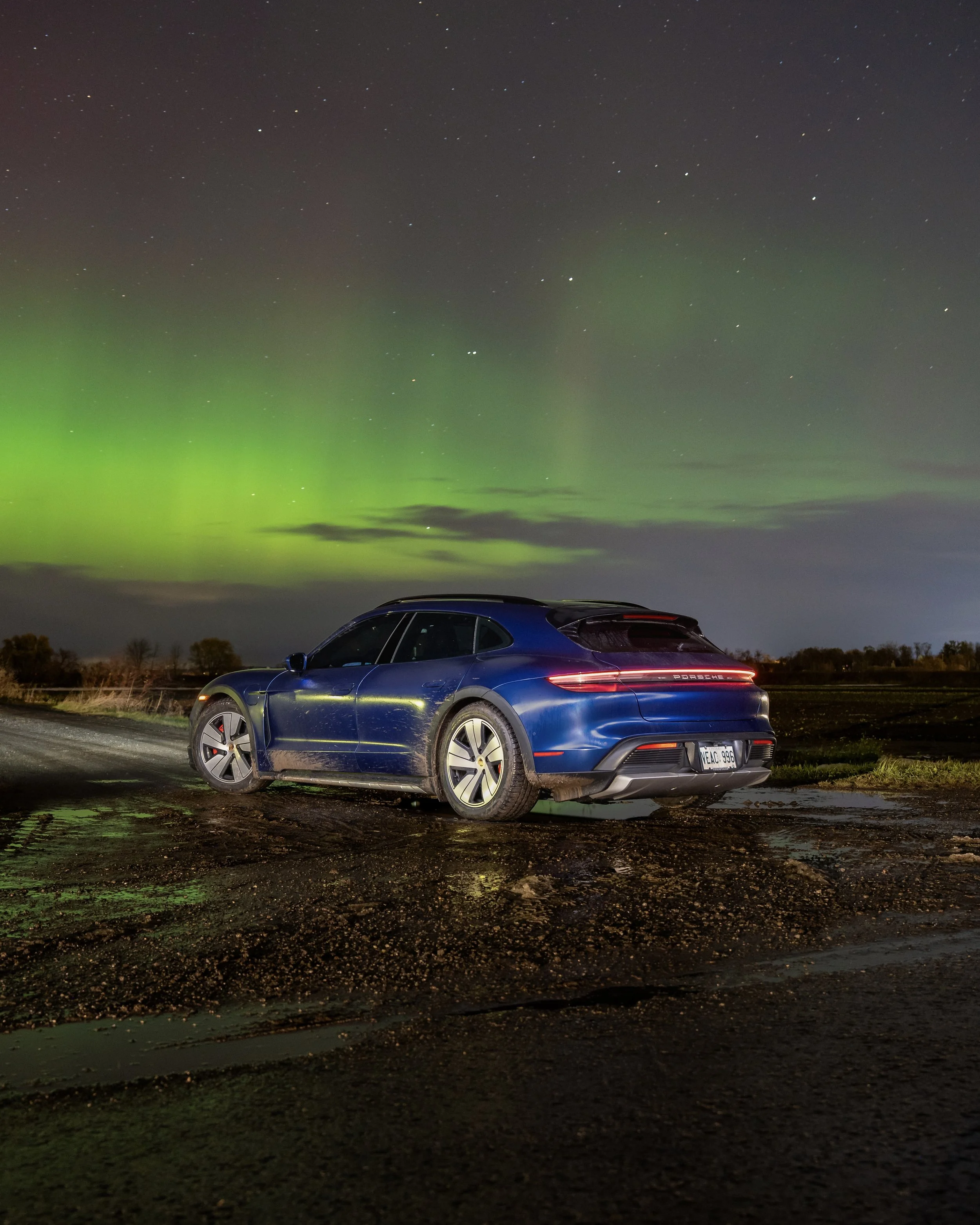 Porsche Taycan Cross Turismo under the Northern Lights in Canada