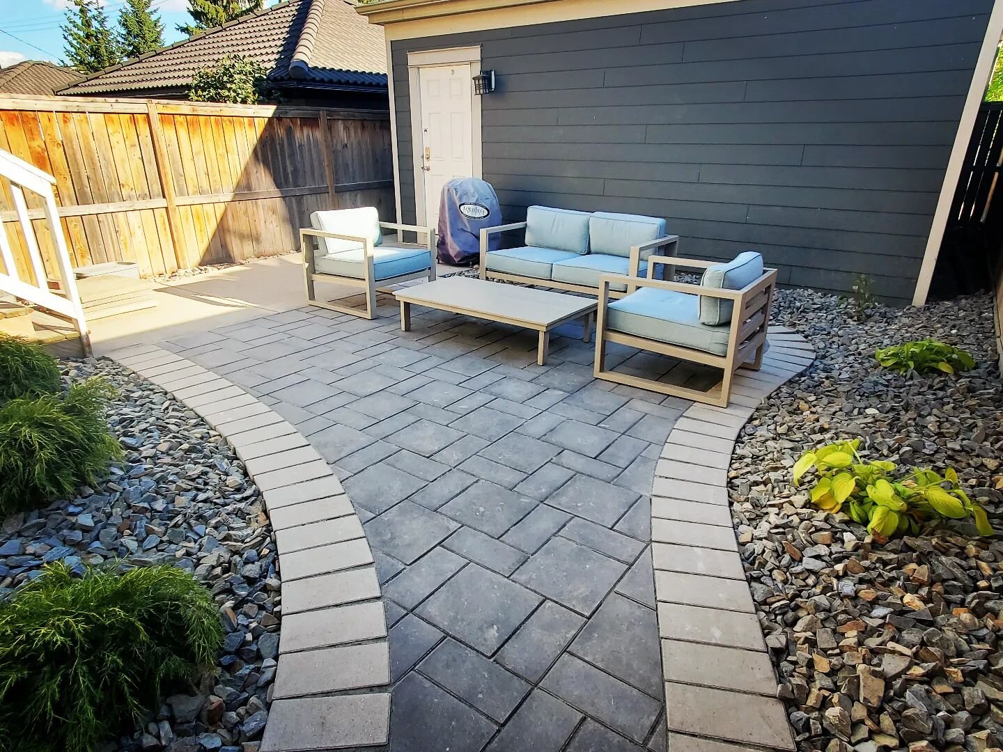 Patio season is just around the corner! 

This small little infill was a bunch of beat up grass until we created a perfect functional outdoor space.  From the boarder around the patio to the small low maintenance shrubs around it, our clients are lov
