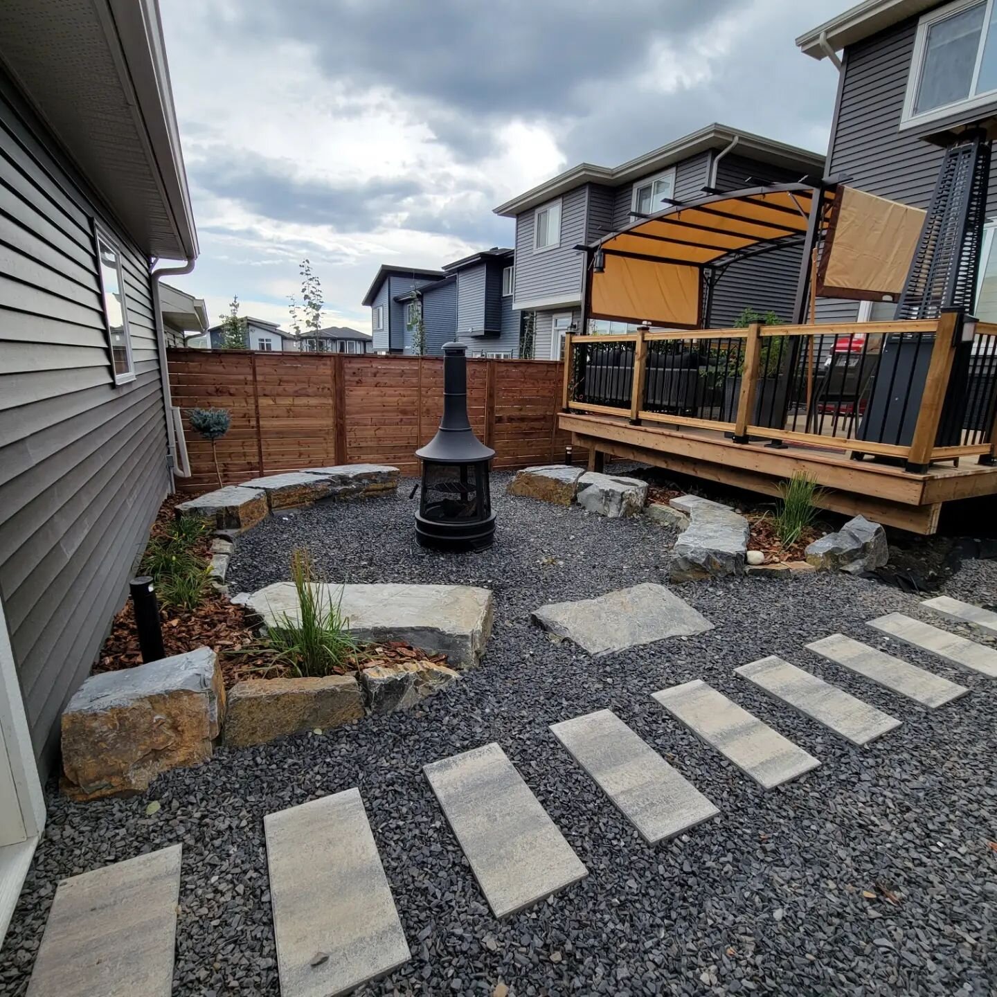 New cozy backyard with our zero maintenance package! 

Call us today for a free estimate.

4034717588

#yournaturalstonespecialists #kootneybrownstone #boulders #cochrane #landscaping #construction #yyclandscpaing #calgary #calgarylandacaping #firepl