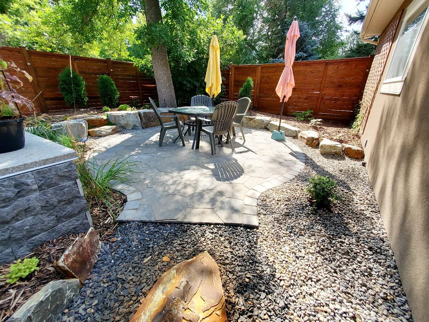 Patio season has officially started! 

A lot of people don't know what to do with their inconviently sloped backyard but... digging in to that slope to create a sunken patio is one of the most beautiful landscape features available.

Call us now for 