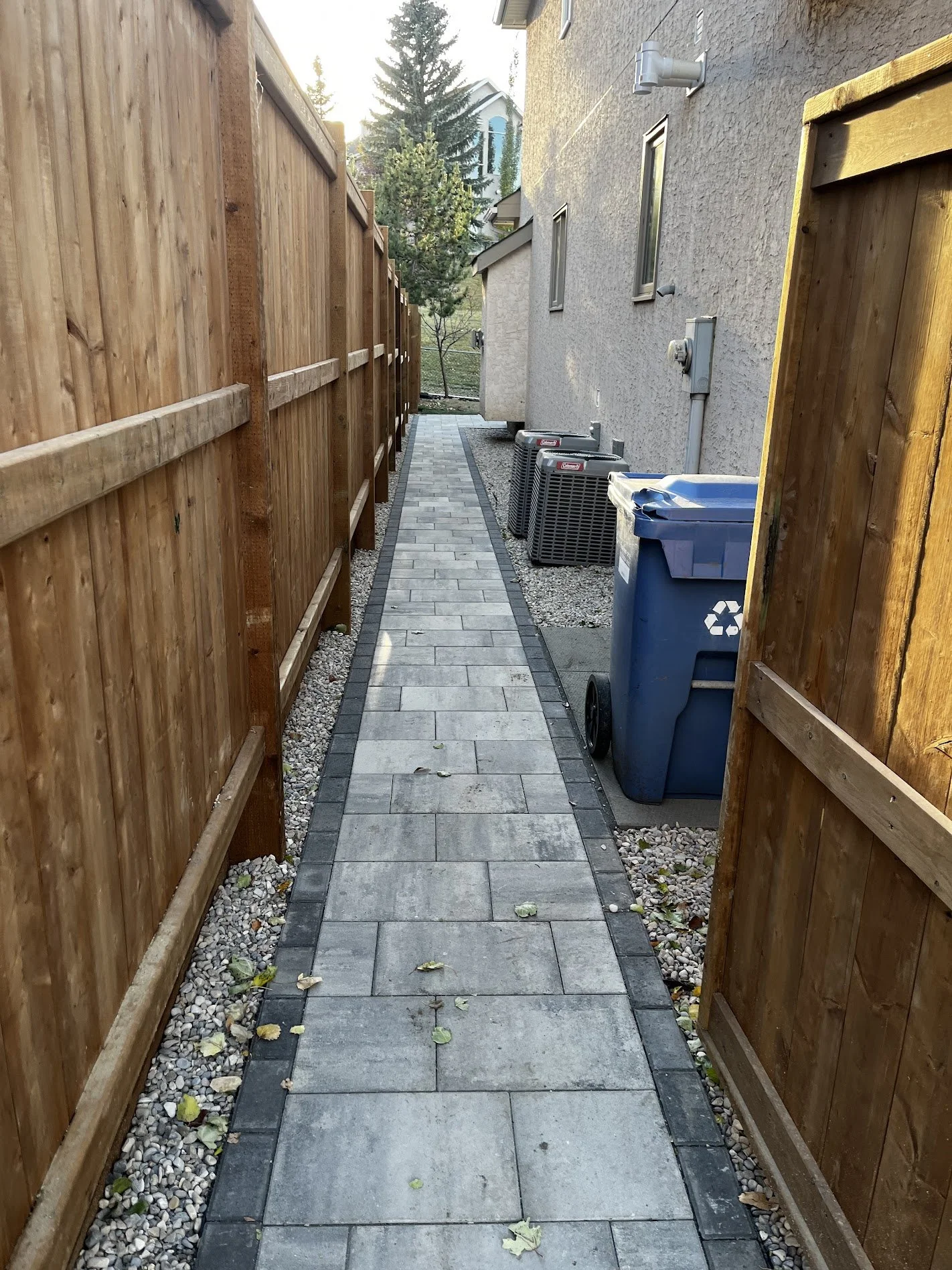 Backyard landscaping hardscaping stone and grass - Brandon G v2.jpg