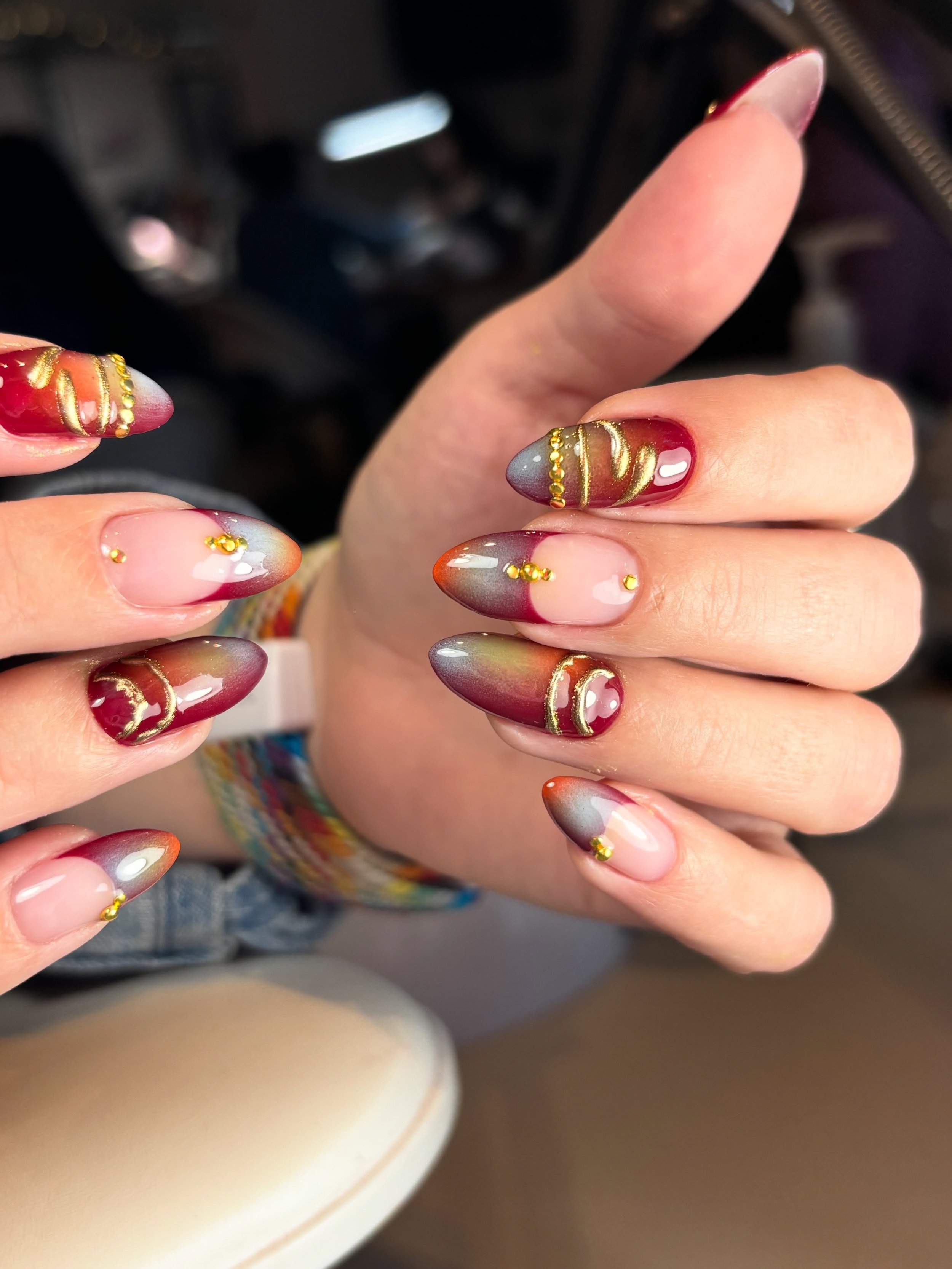Queen energy 👑❣️ obsessed with the effortless blend of this airbrushed design layered with golden adornments 💛 done by Halie 
&bull;
#russianmanicuredenver #denvernailsalon #denvernails #denvernailtech #denvernailartist