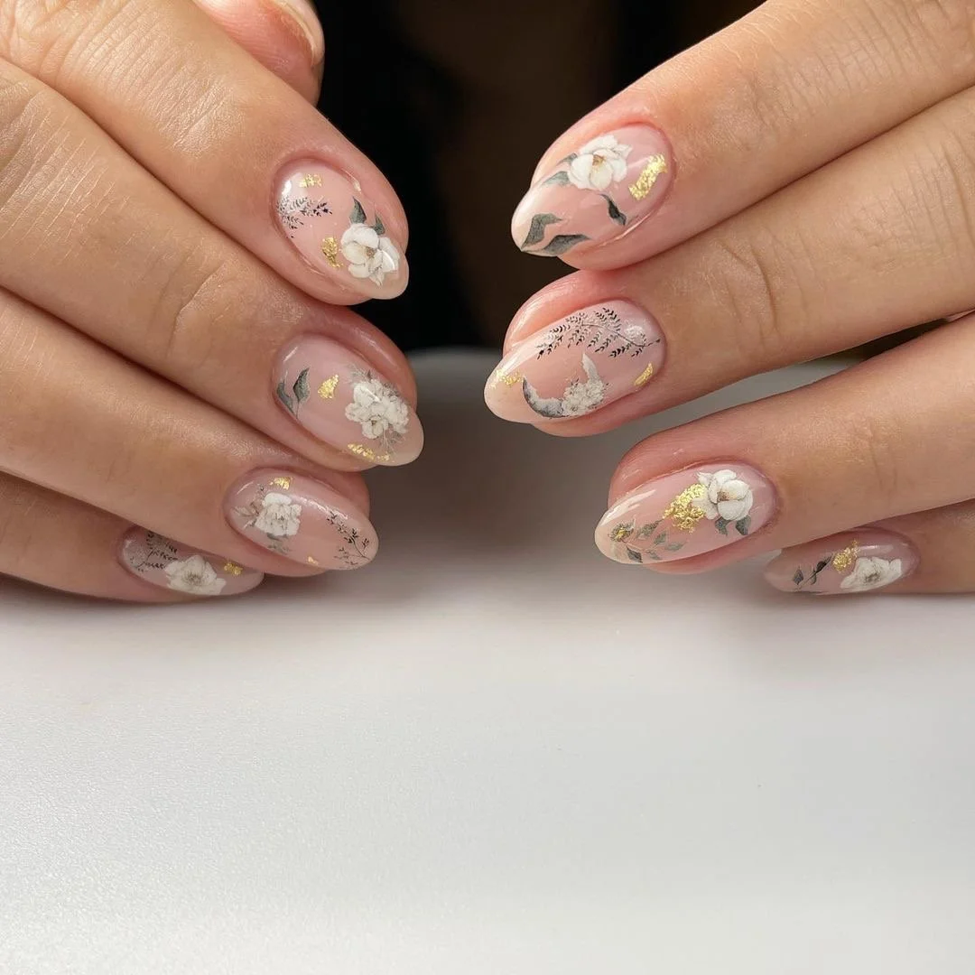 Spring flower nail art with Russian manicure performed. Available in Lakewood, CO