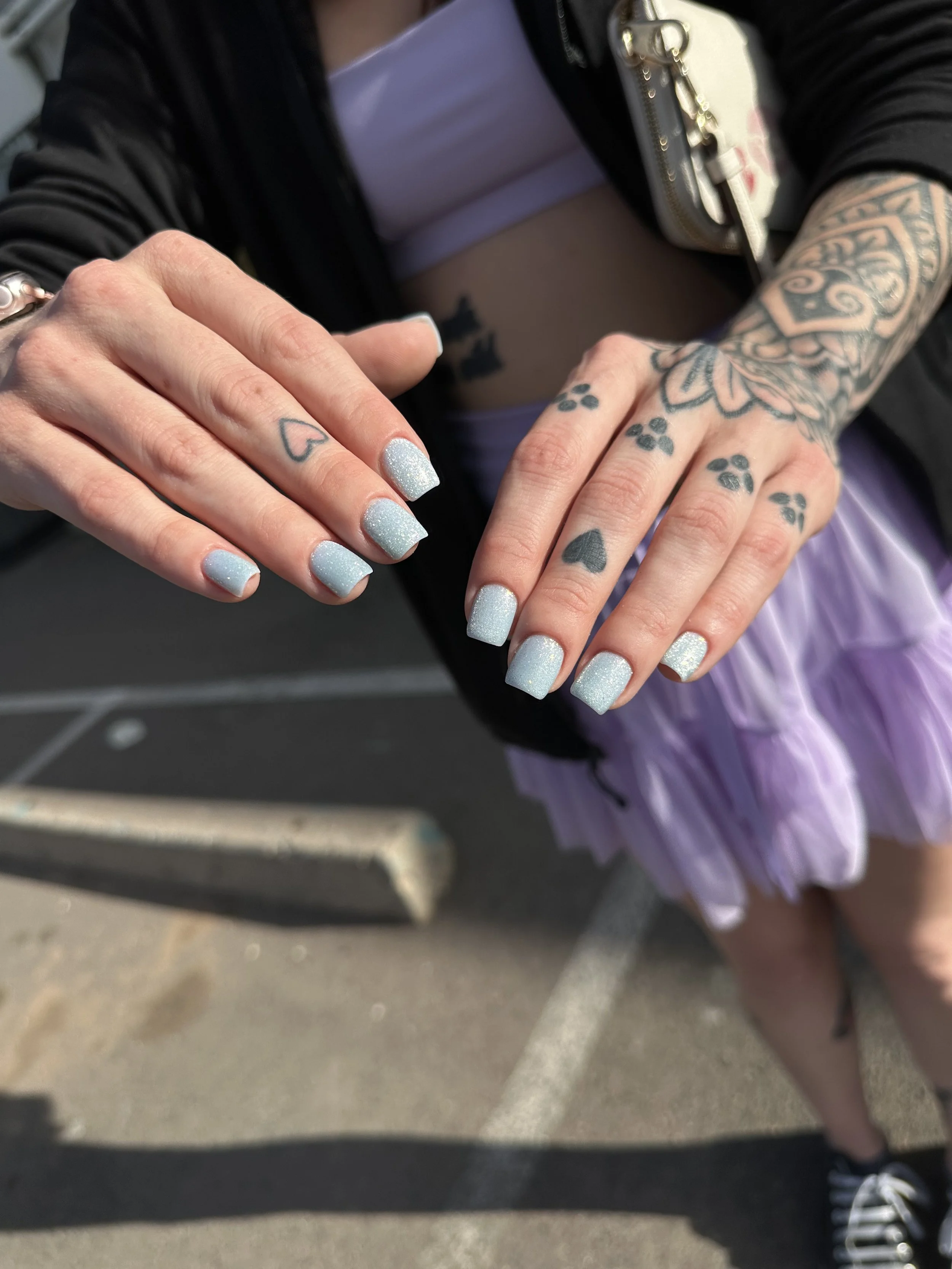 Blue french gel nail art with Heart and isolated chrome manicure